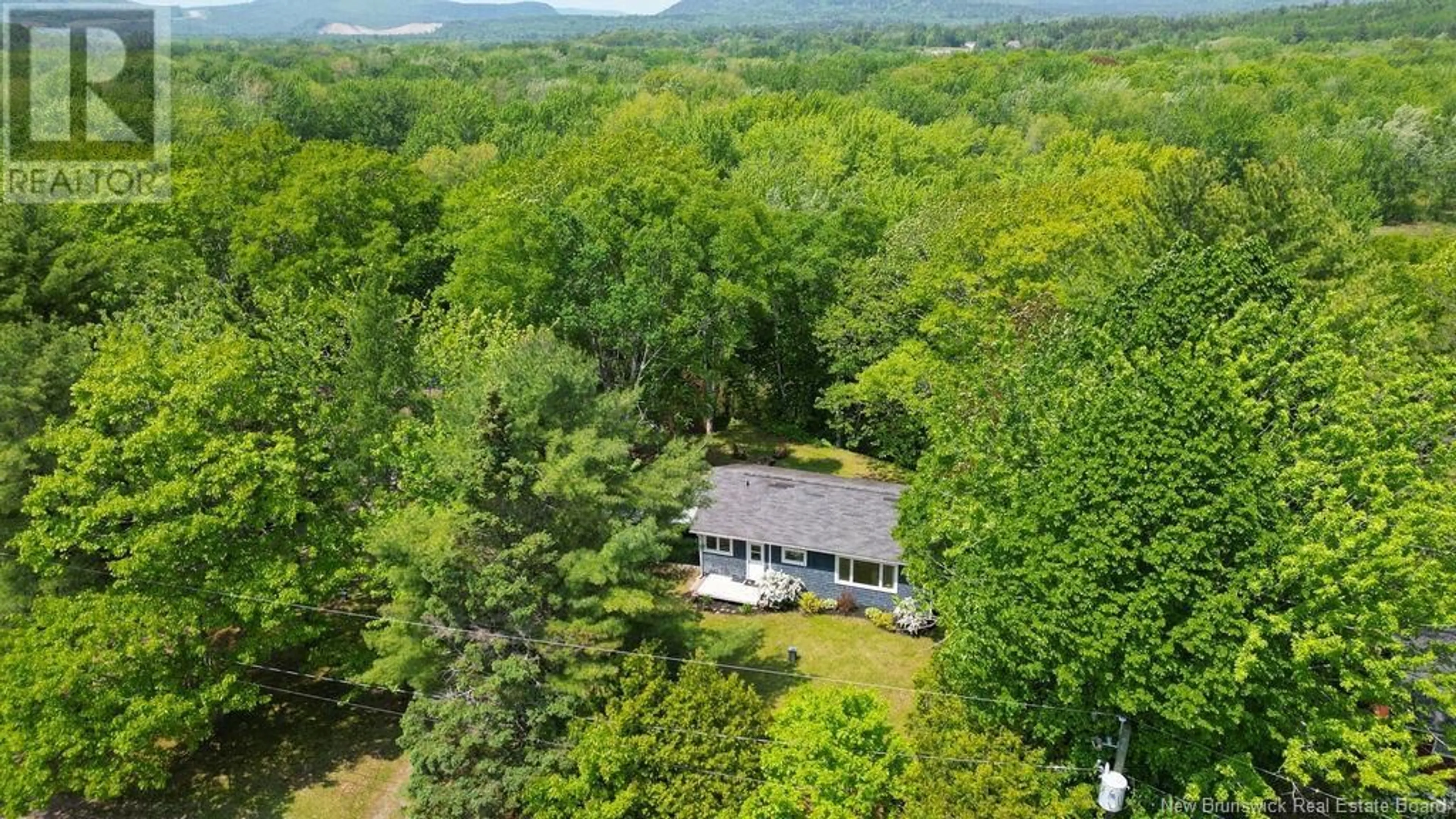 A pic from outside/outdoor area/front of a property/back of a property/a pic from drone, water/lake/river/ocean view for 26 OAK DRIVE, Saint John New Brunswick E5K4S2