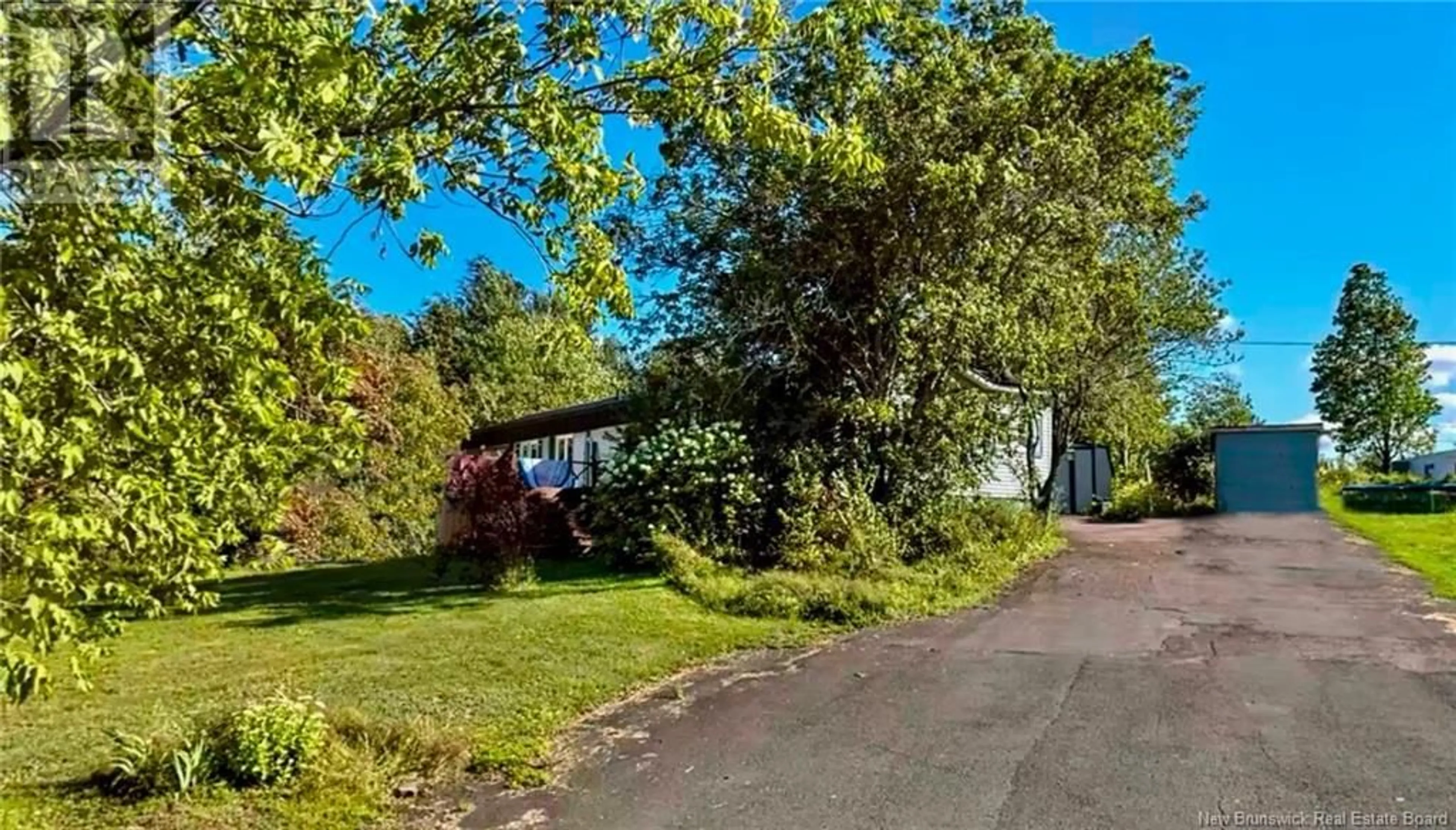 A pic from outside/outdoor area/front of a property/back of a property/a pic from drone, street for 71 MOSS LANE, Riverview New Brunswick E1B5A9