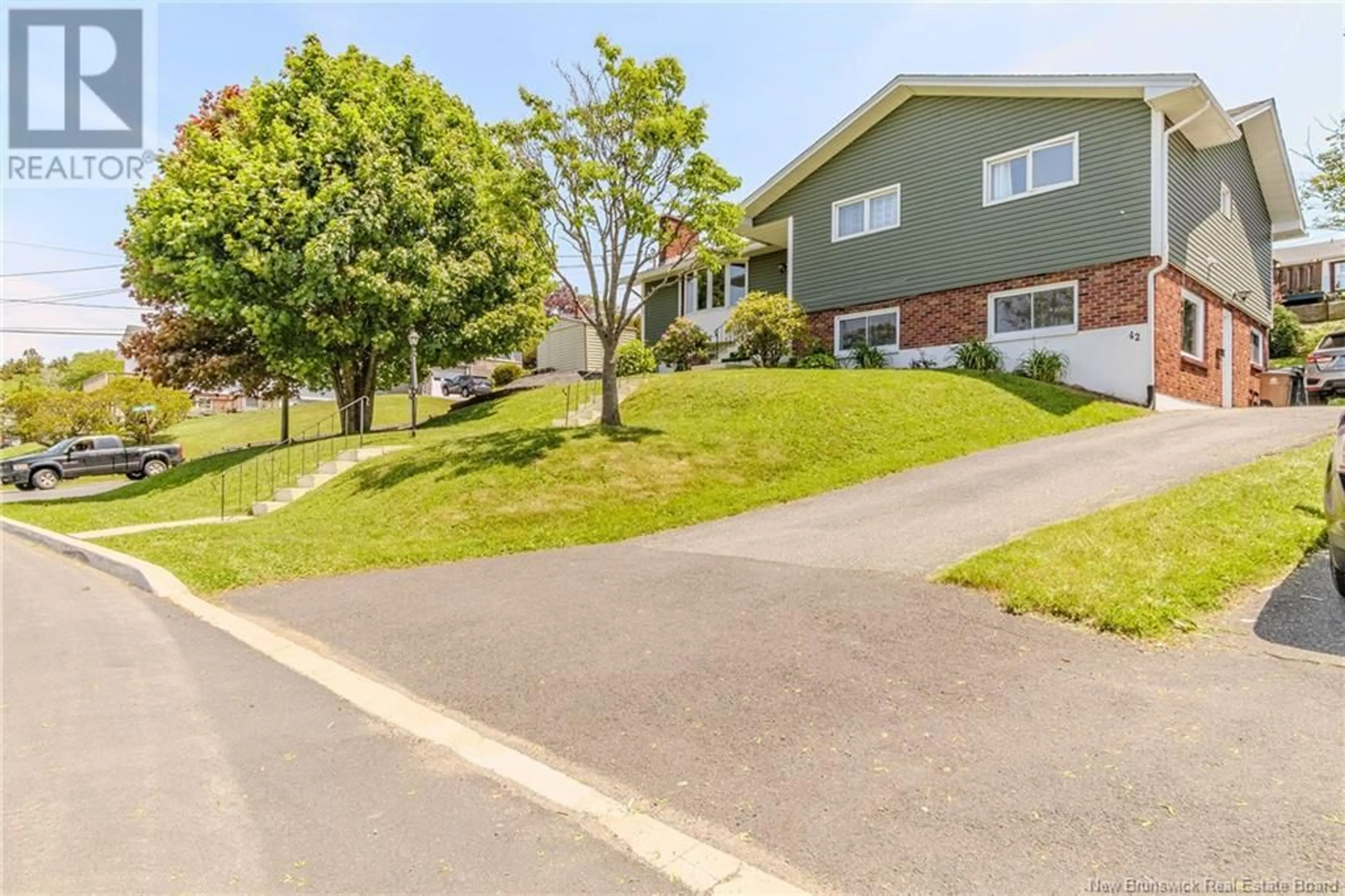 A pic from outside/outdoor area/front of a property/back of a property/a pic from drone, street for 61 NORTHUMBERLAND AVENUE, Saint John New Brunswick E2J2L2
