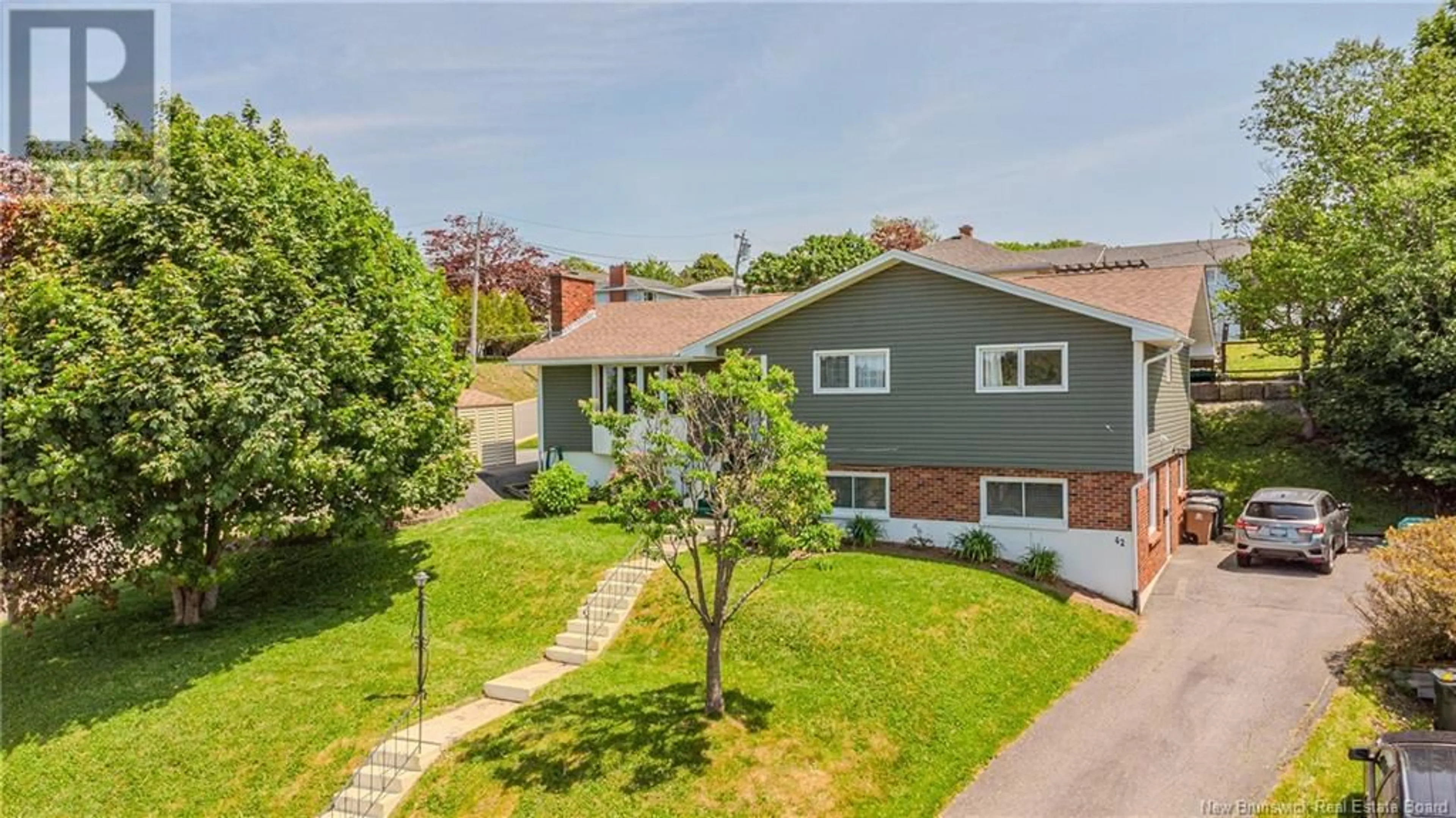 A pic from outside/outdoor area/front of a property/back of a property/a pic from drone, street for 61 NORTHUMBERLAND AVENUE, Saint John New Brunswick E2J2L2
