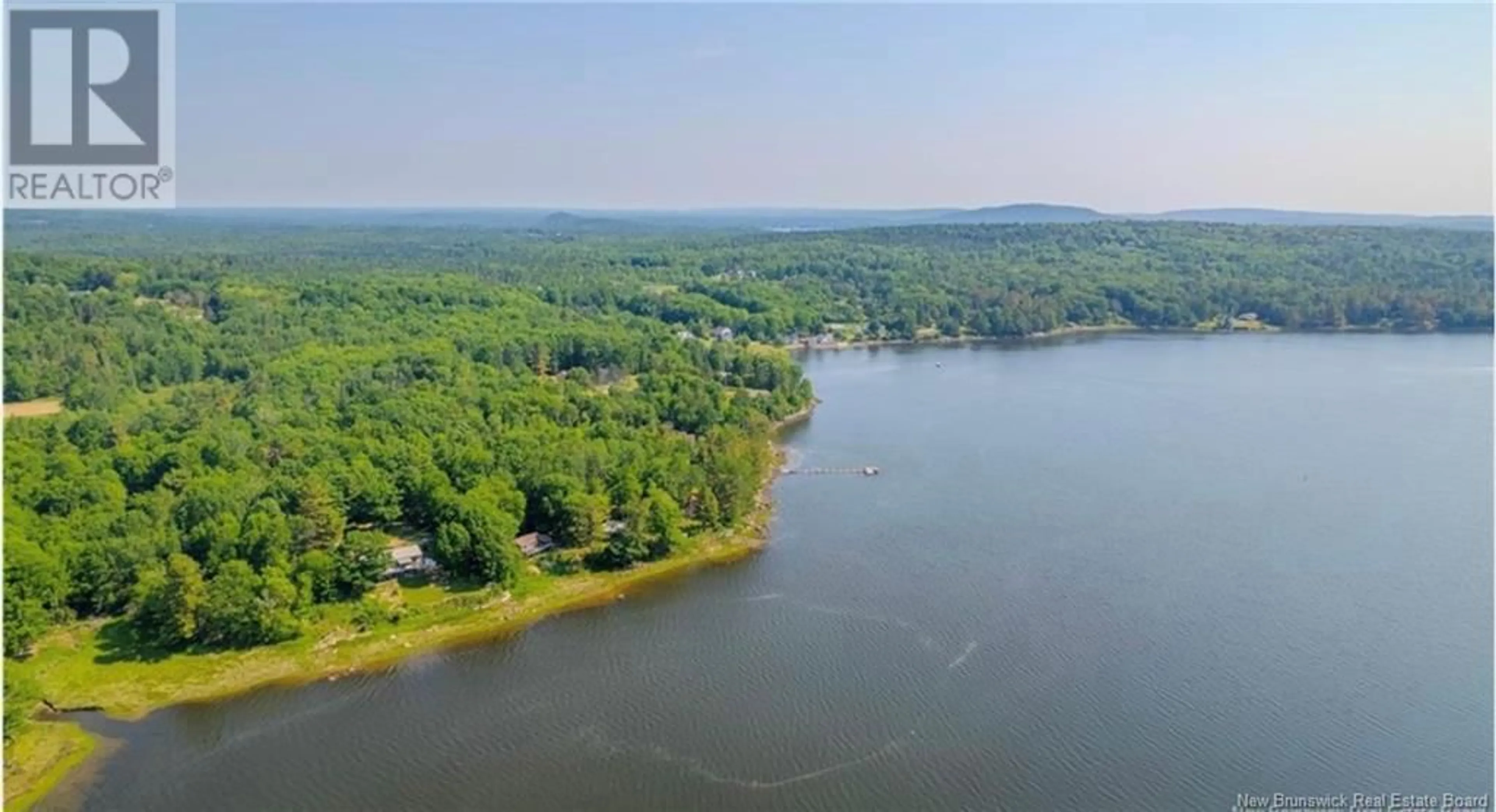 A pic from outside/outdoor area/front of a property/back of a property/a pic from drone, water/lake/river/ocean view for 22 MARKS POINT ROAD, Dufferin New Brunswick E3L3P8