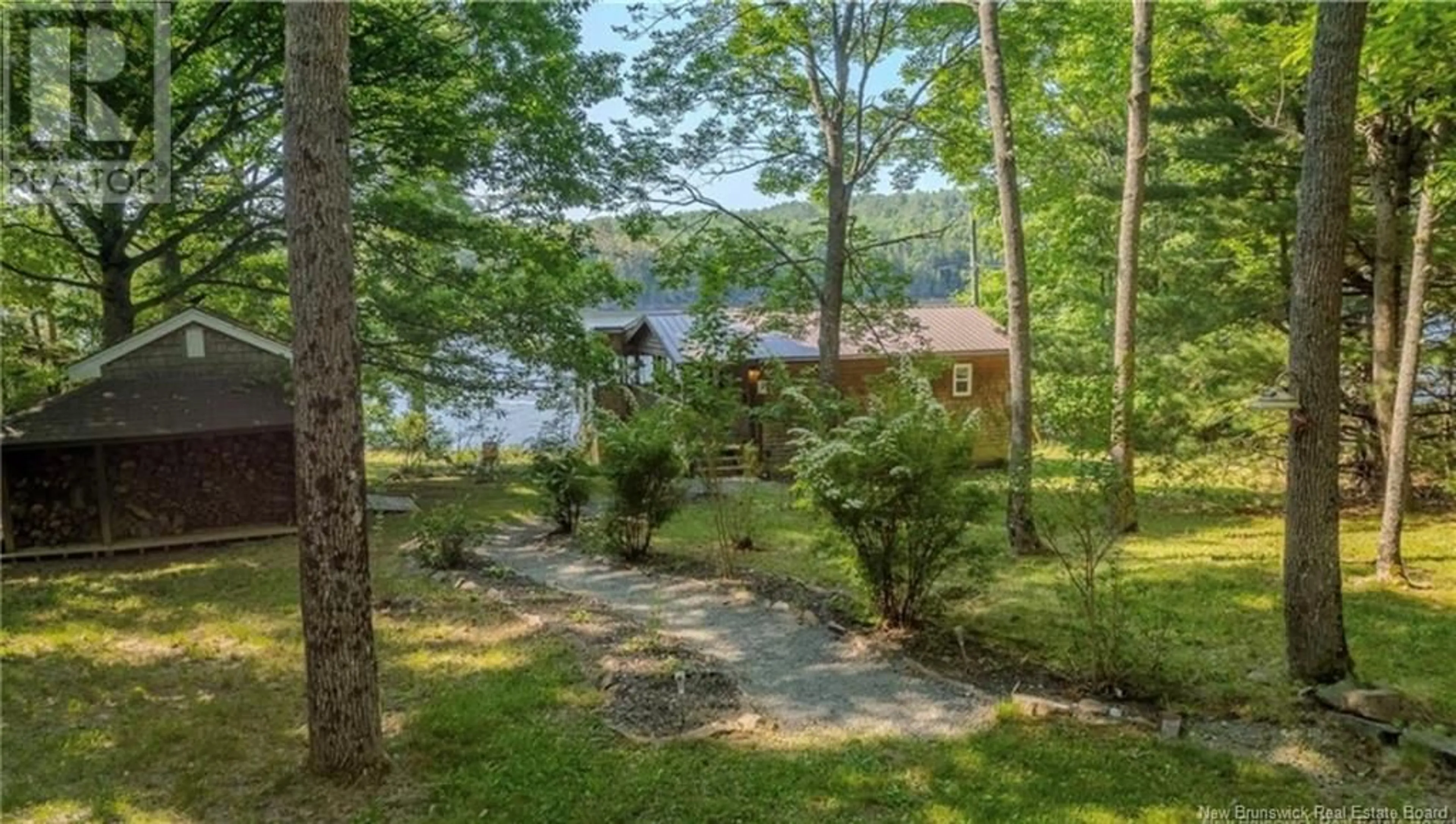 A pic from outside/outdoor area/front of a property/back of a property/a pic from drone, water/lake/river/ocean view for 22 MARKS POINT ROAD, Dufferin New Brunswick E3L3P8