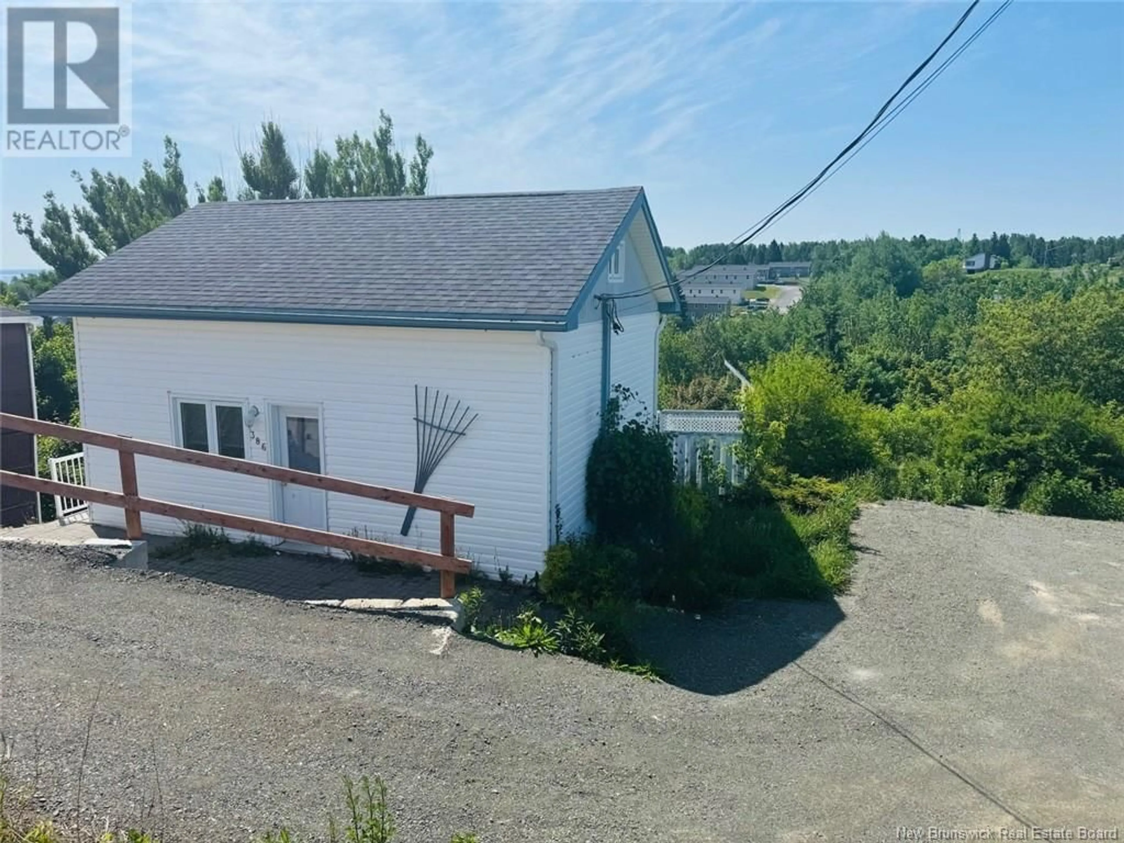 A pic from outside/outdoor area/front of a property/back of a property/a pic from drone, building for 386 SANSOM STREET, Dalhousie New Brunswick E8C2L1