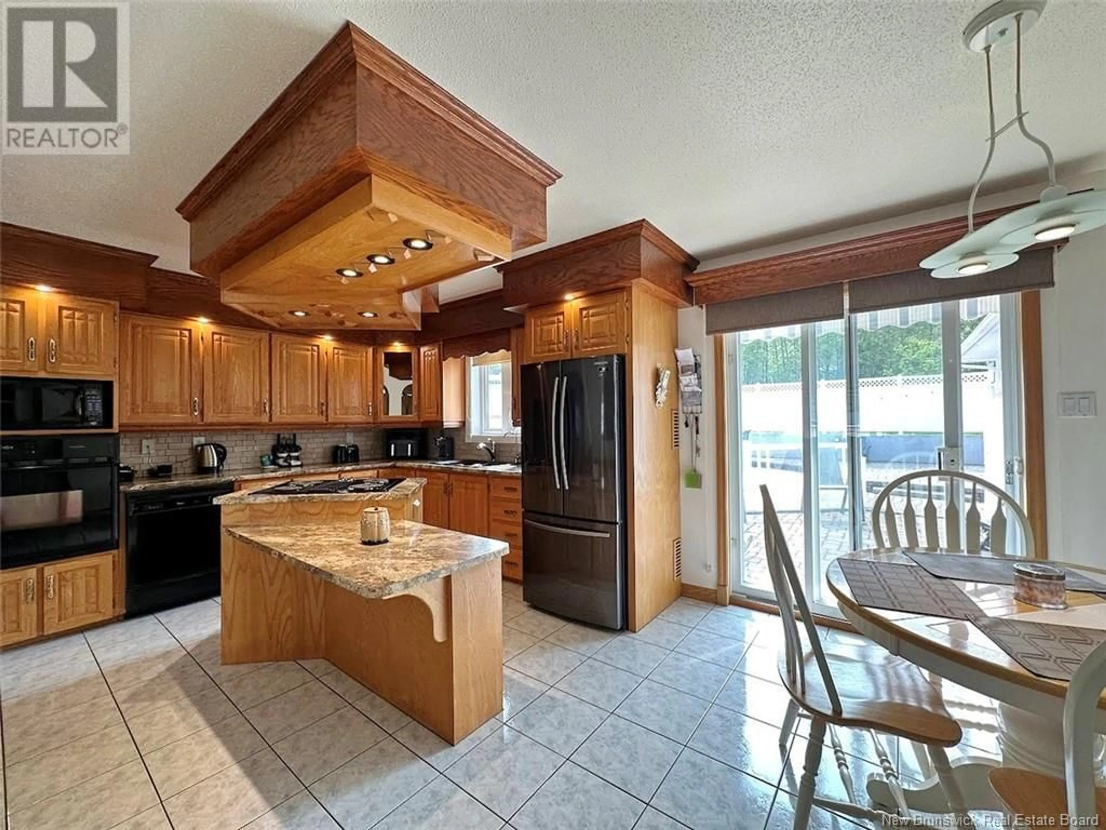 Open concept kitchen, ceramic/tile floor for 1297 ST-FRANCOIS STREET, Edmundston New Brunswick E3V4P2