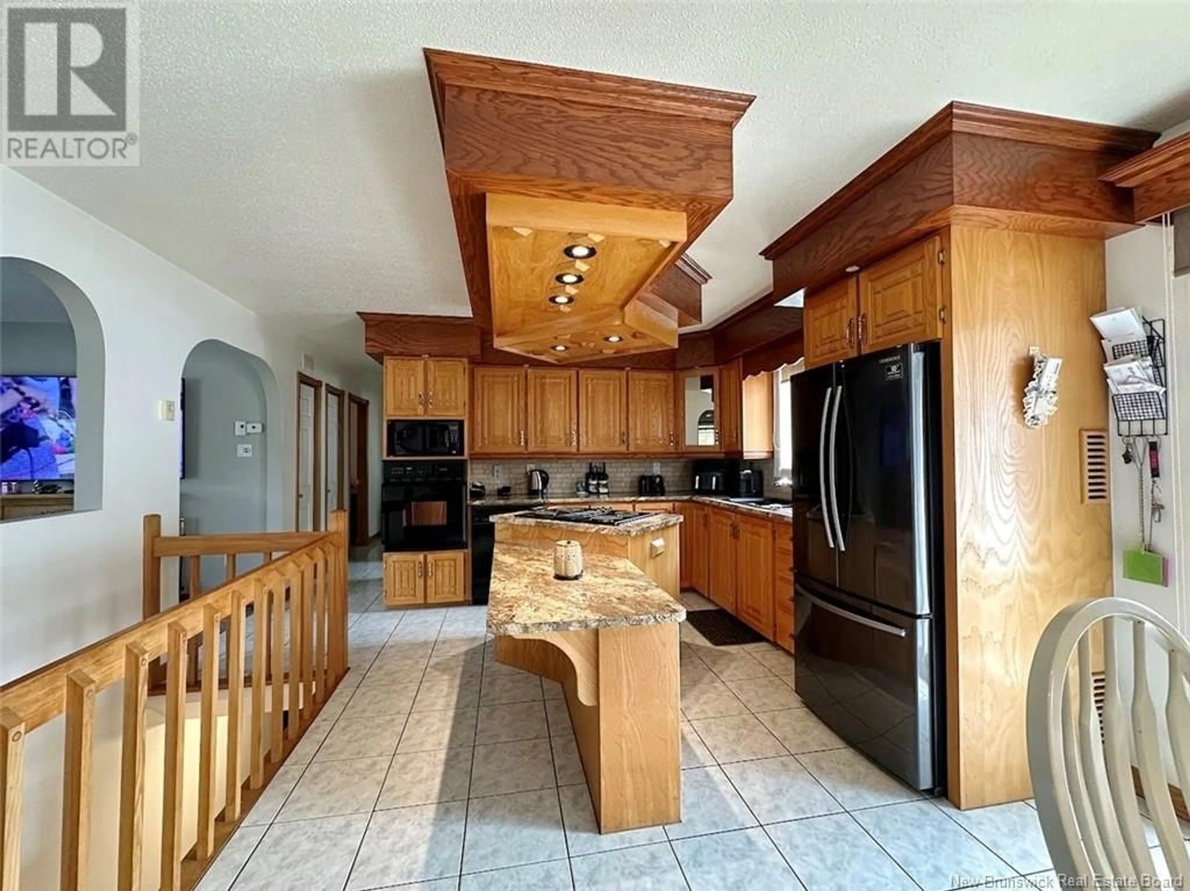 Open concept kitchen, ceramic/tile floor for 1297 ST-FRANCOIS STREET, Edmundston New Brunswick E3V4P2