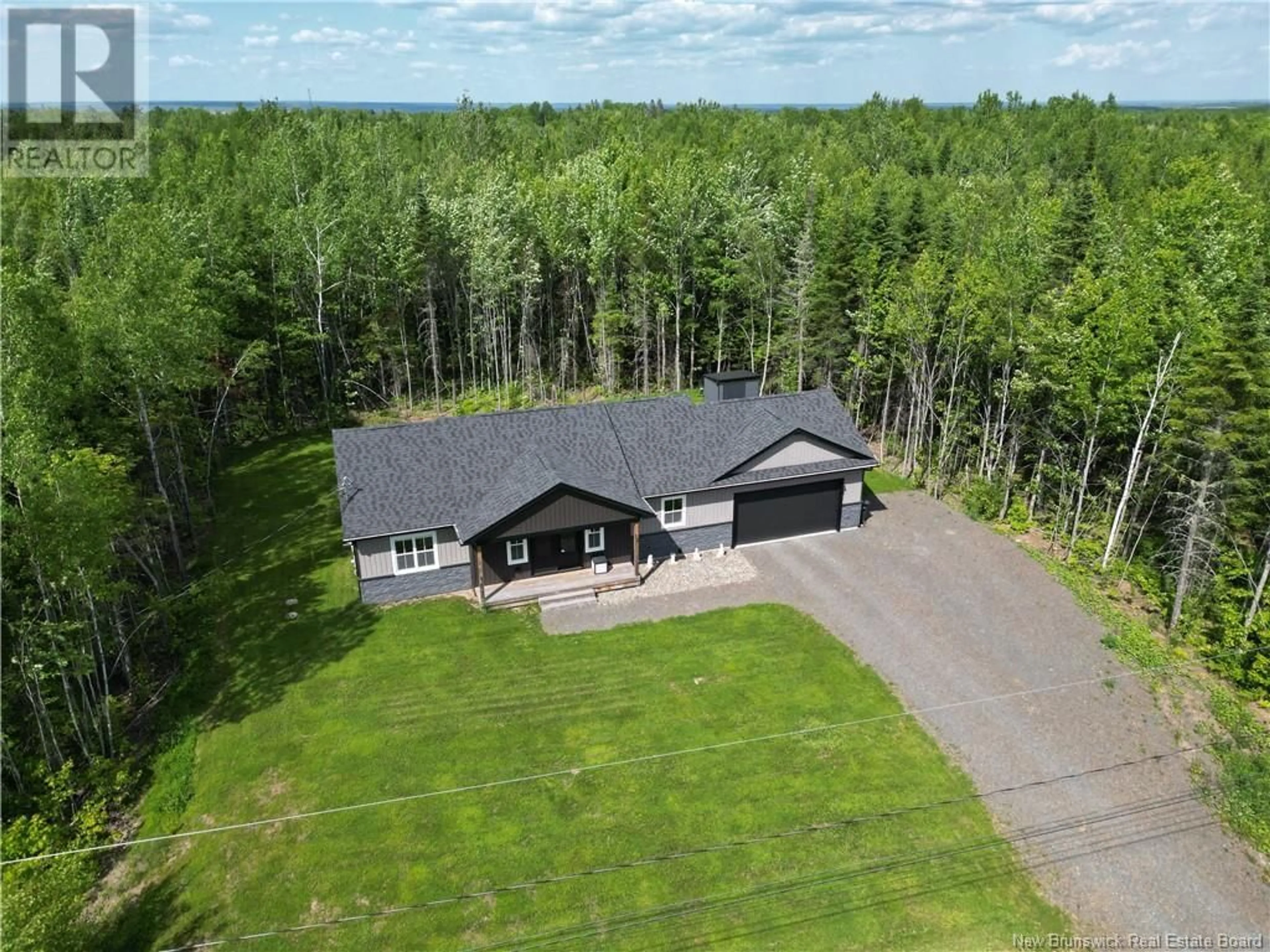 A pic from outside/outdoor area/front of a property/back of a property/a pic from drone, forest/trees view for 12 BARBARA DRIVE, Rusagonis-Waasis New Brunswick E3B5G7