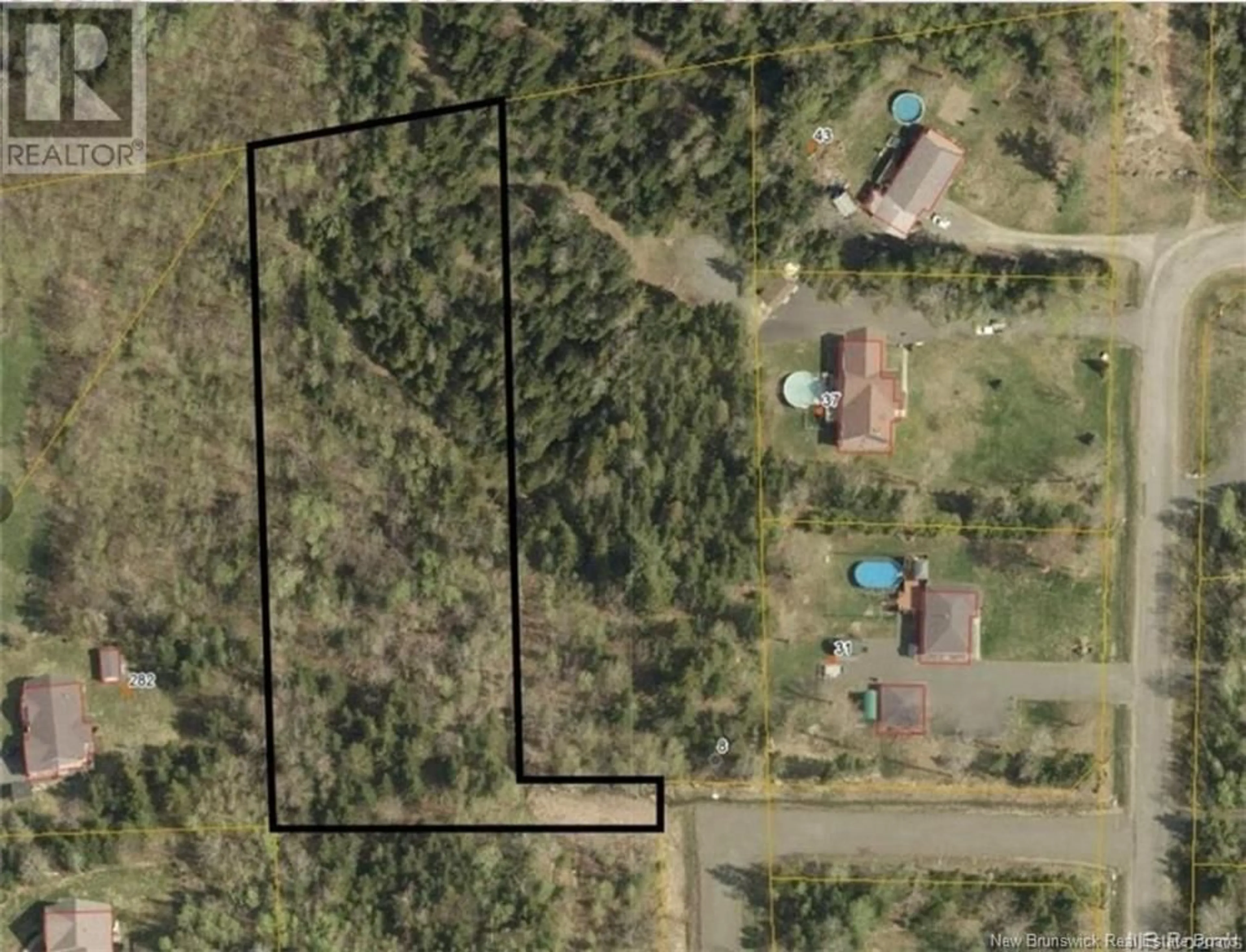 A pic from outside/outdoor area/front of a property/back of a property/a pic from drone, forest/trees view for Lot - 2020-2 CALEAH LANE, Hanwell New Brunswick E3C1N9