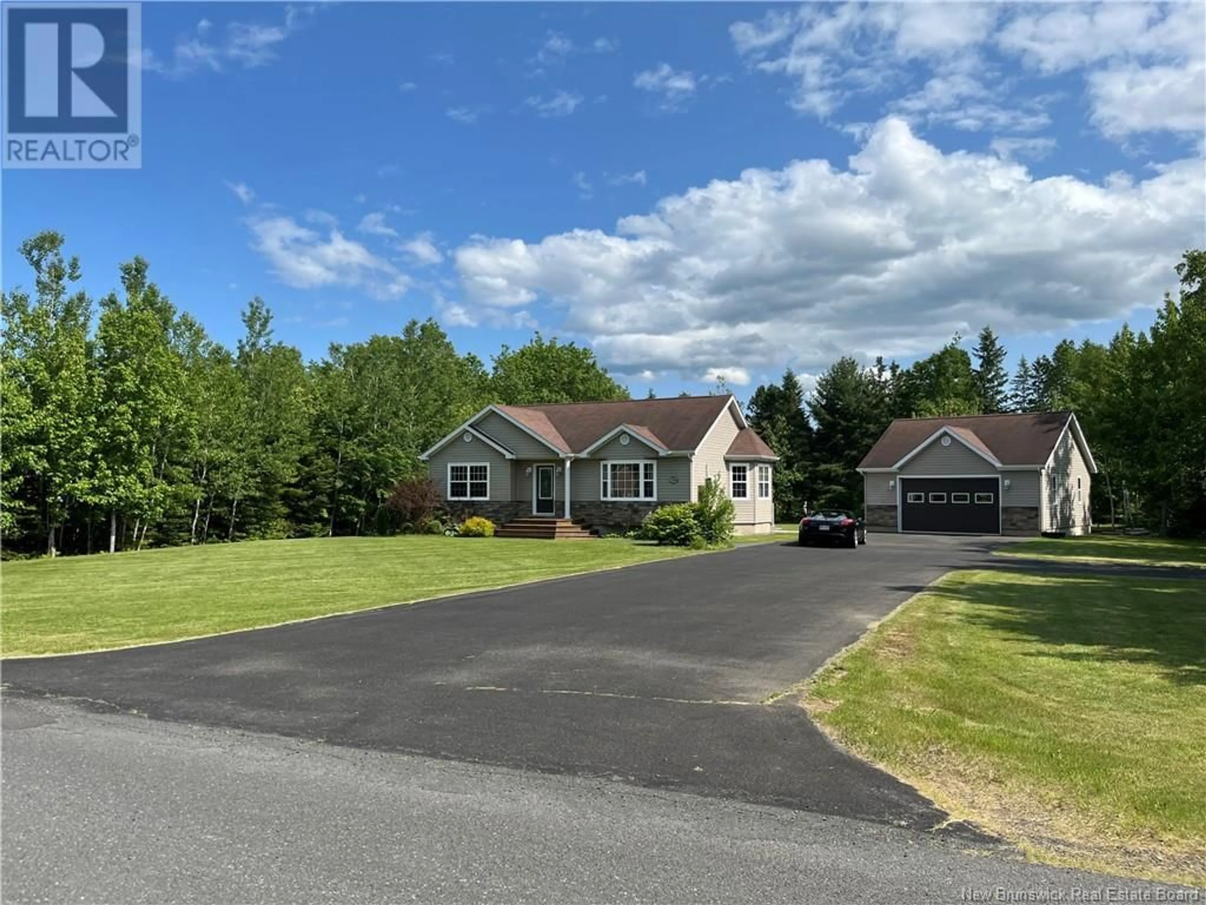 A pic from outside/outdoor area/front of a property/back of a property/a pic from drone, street for 1754 PEUPLIERS, Paquetville New Brunswick E8R1B9