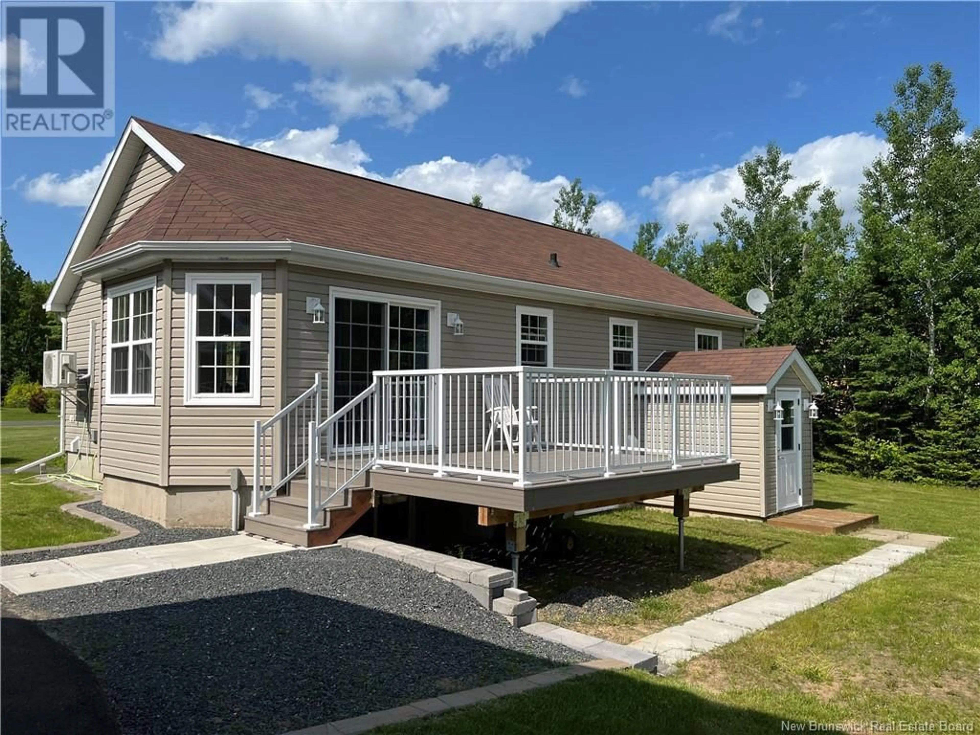 Home with vinyl exterior material, street for 1754 PEUPLIERS, Paquetville New Brunswick E8R1B9