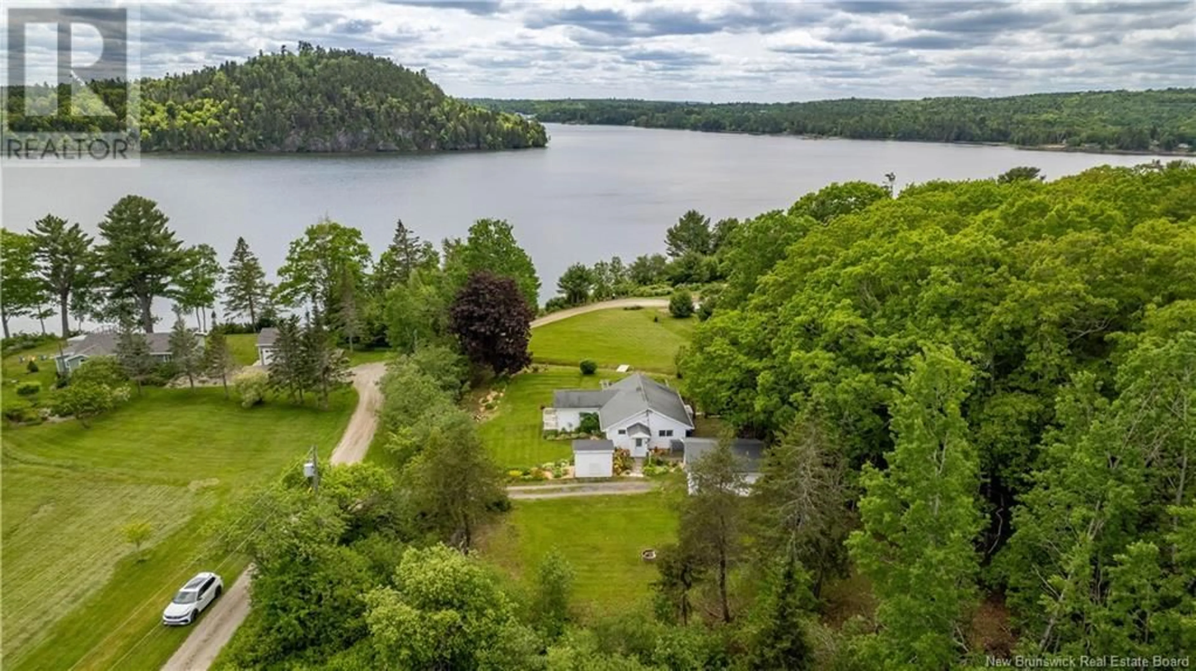 A pic from outside/outdoor area/front of a property/back of a property/a pic from drone, water/lake/river/ocean view for 32 COOKS LANE, Oak Bay New Brunswick E3L4H1