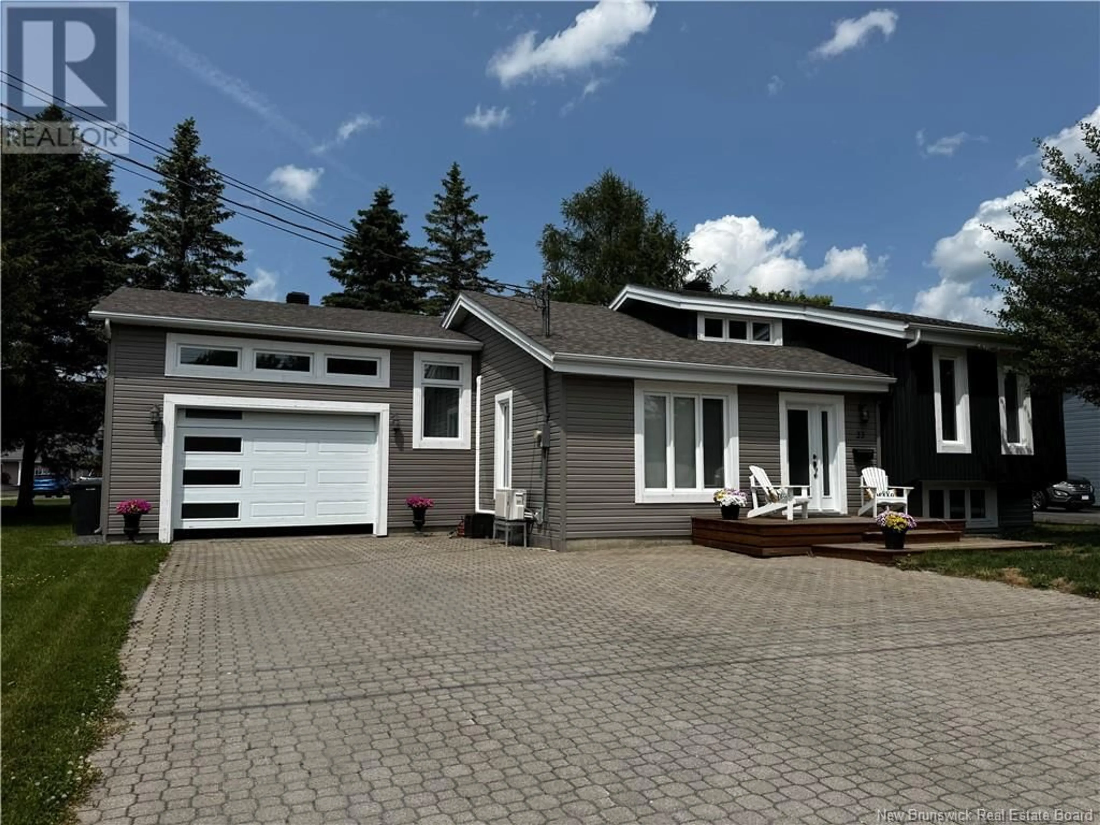 Home with vinyl exterior material, street for 33 BOSSÉ AVENUE, Edmundston New Brunswick E3V3Z8
