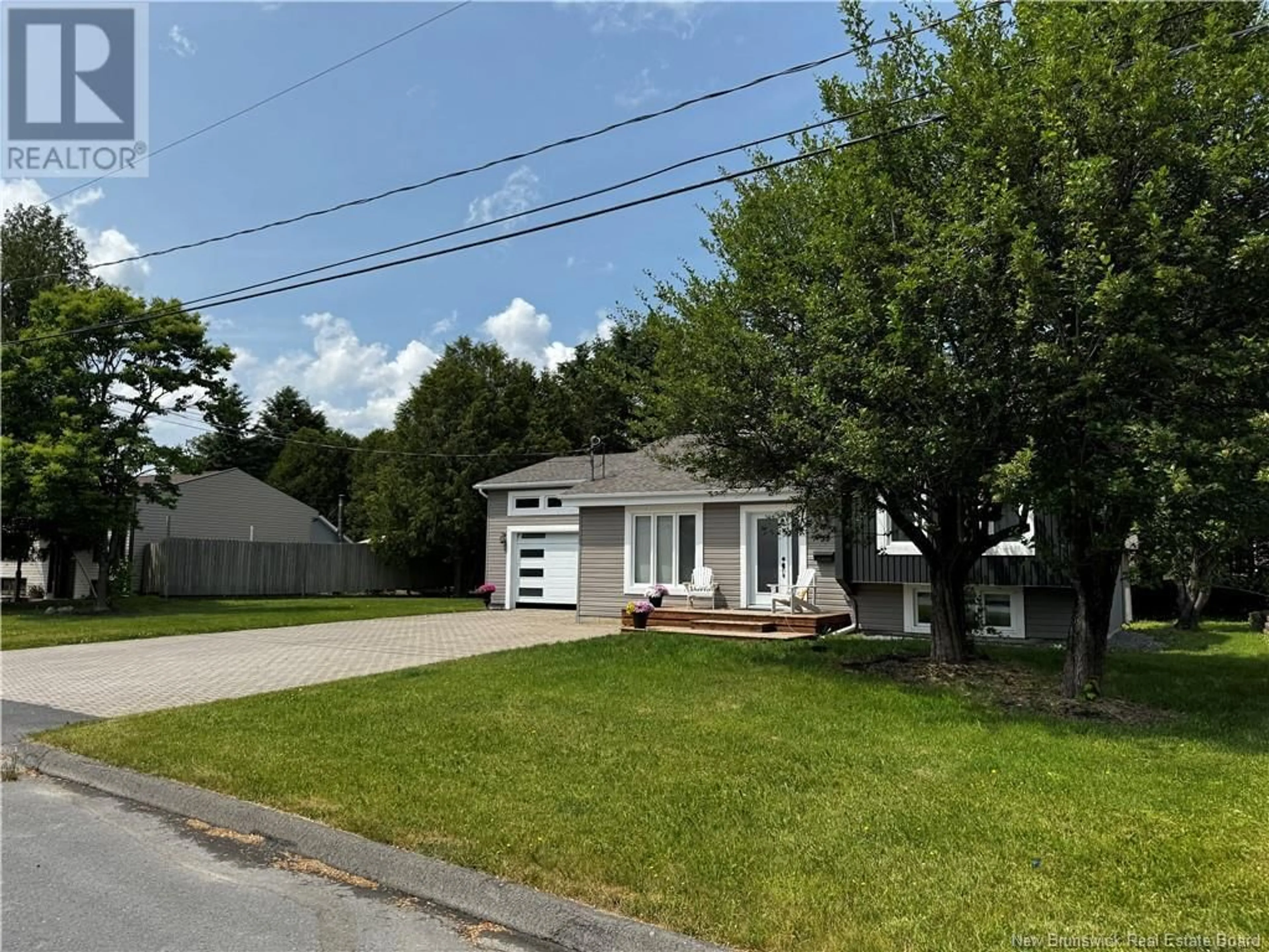 Home with vinyl exterior material, street for 33 BOSSÉ AVENUE, Edmundston New Brunswick E3V3Z8