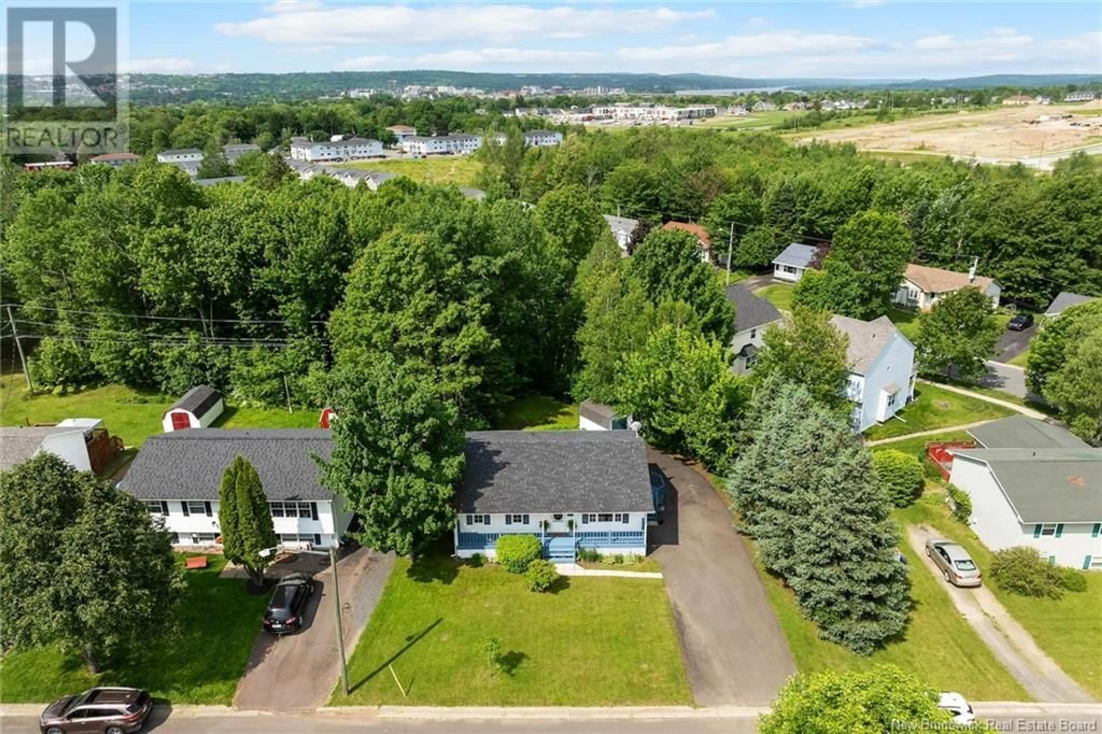 A pic from outside/outdoor area/front of a property/back of a property/a pic from drone, street for 91 STAFFORD DRIVE, Fredericton New Brunswick E3A5J3