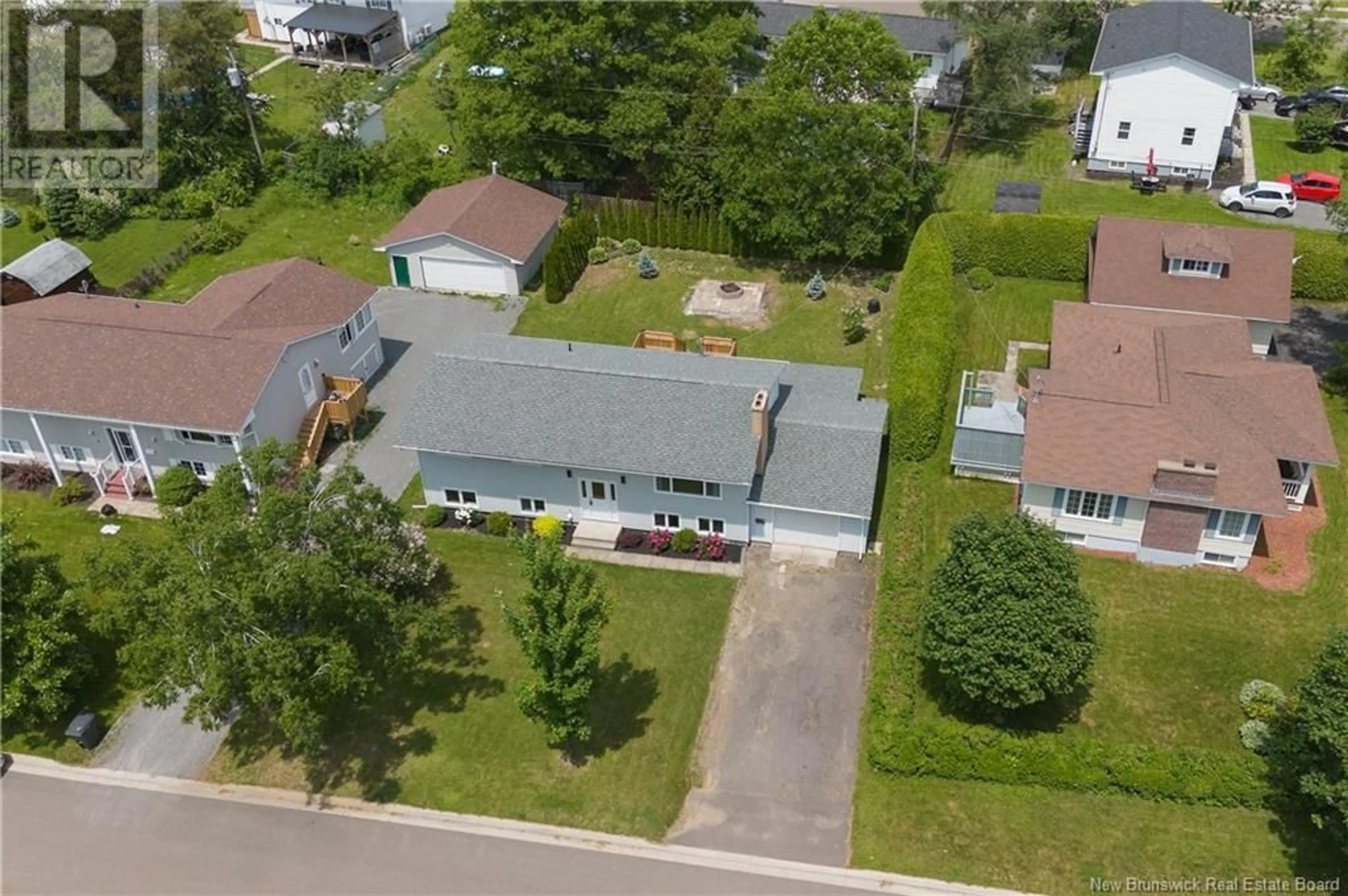 A pic from outside/outdoor area/front of a property/back of a property/a pic from drone, street for 9 DAHLIA DRIVE, Fredericton New Brunswick E3A1N2