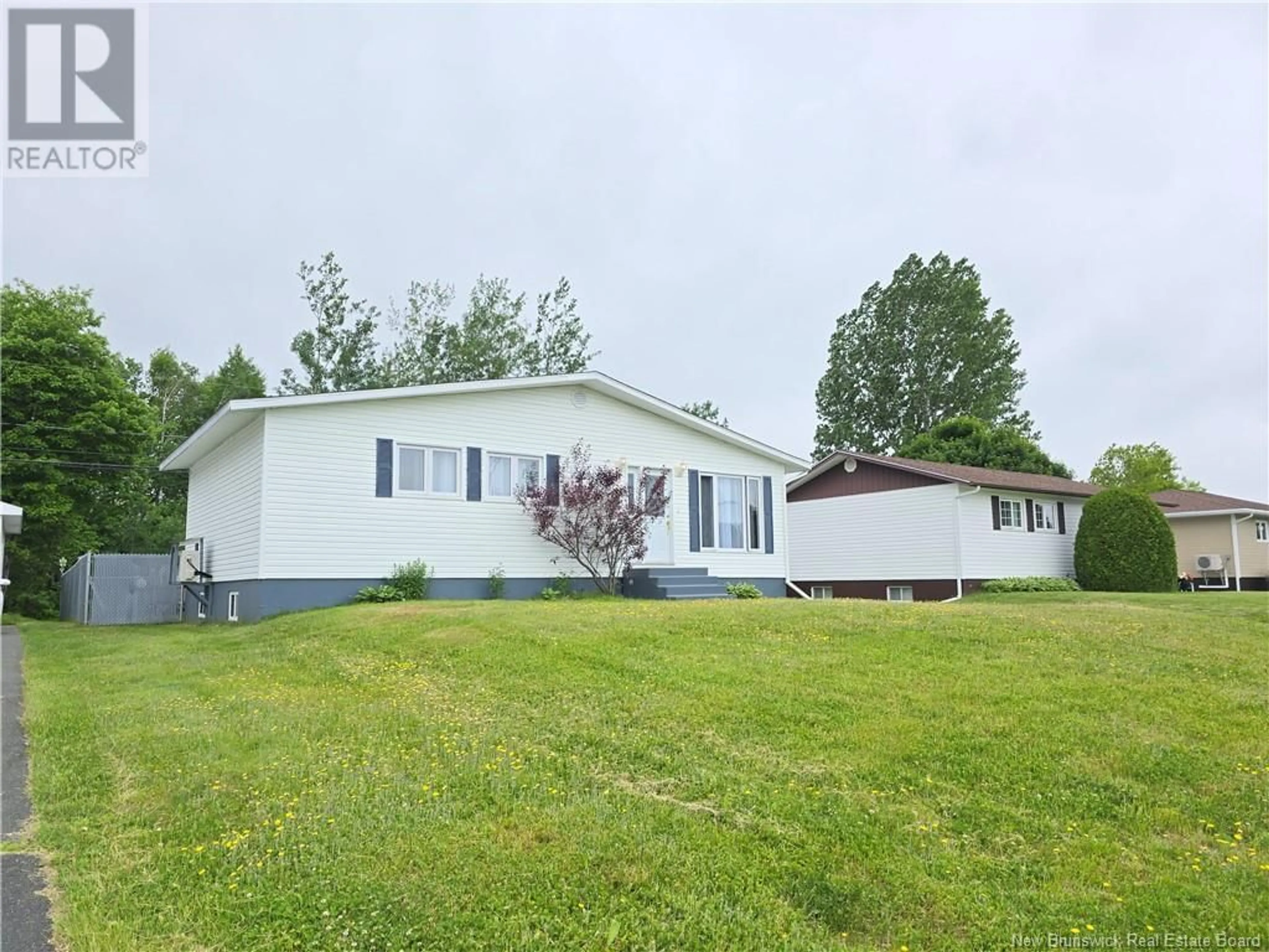 A pic from outside/outdoor area/front of a property/back of a property/a pic from drone, unknown for 1954 BRIDEAU, Bathurst New Brunswick E2A2G8
