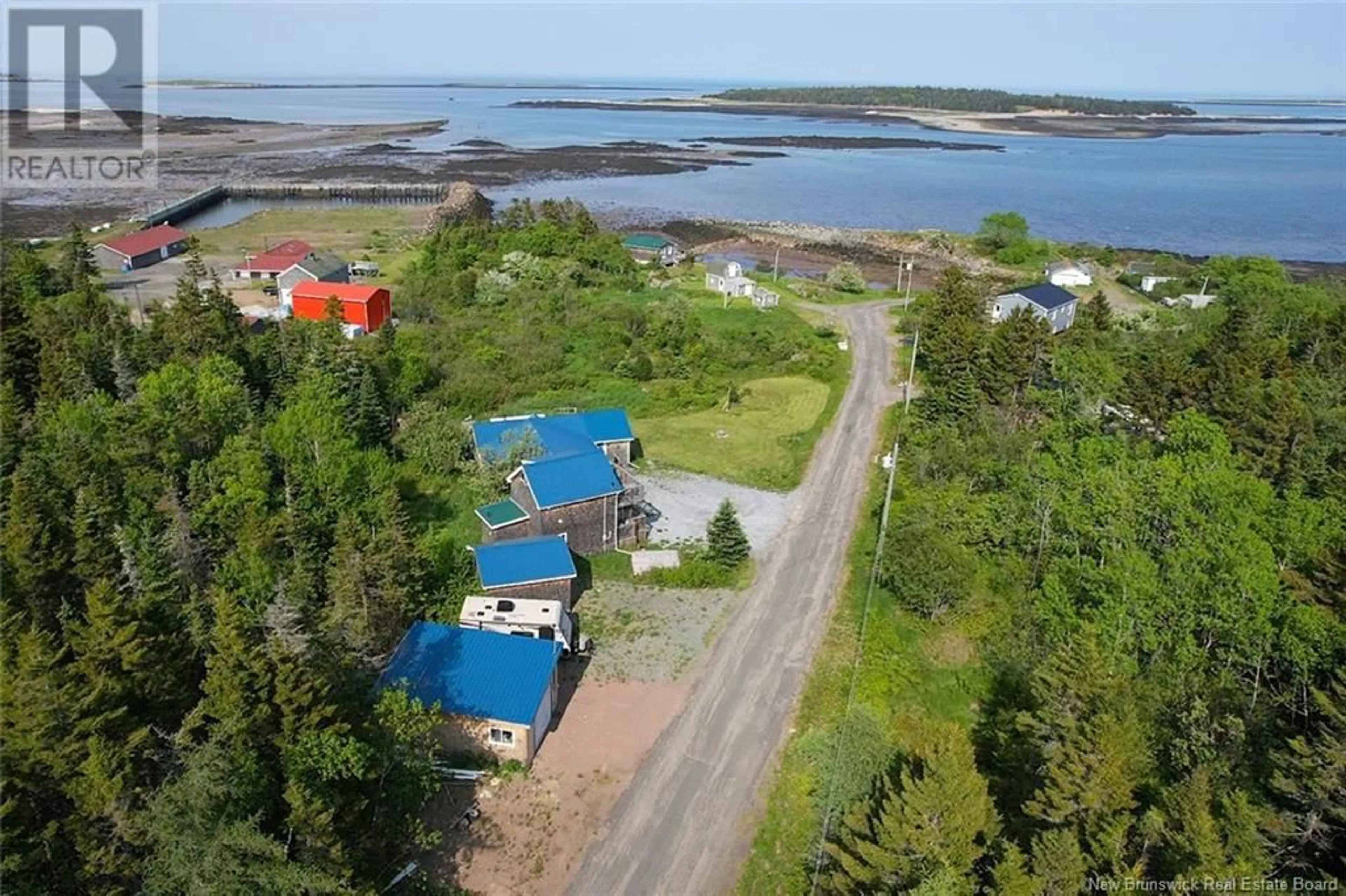 A pic from outside/outdoor area/front of a property/back of a property/a pic from drone, water/lake/river/ocean view for 11 COOK ROAD, Grand Manan New Brunswick E5G4E3