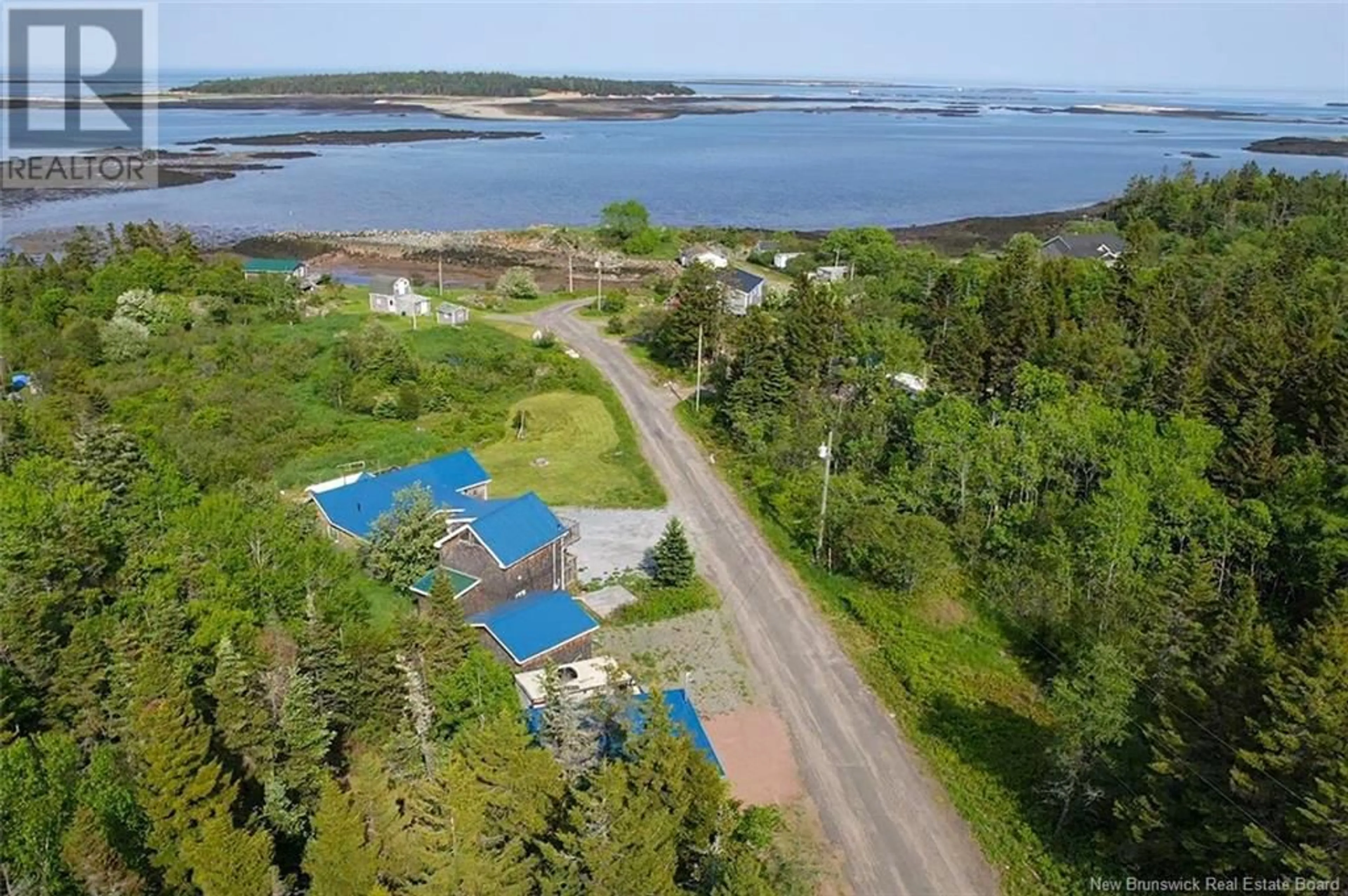 A pic from outside/outdoor area/front of a property/back of a property/a pic from drone, water/lake/river/ocean view for 11 COOK ROAD, Grand Manan New Brunswick E5G4E3