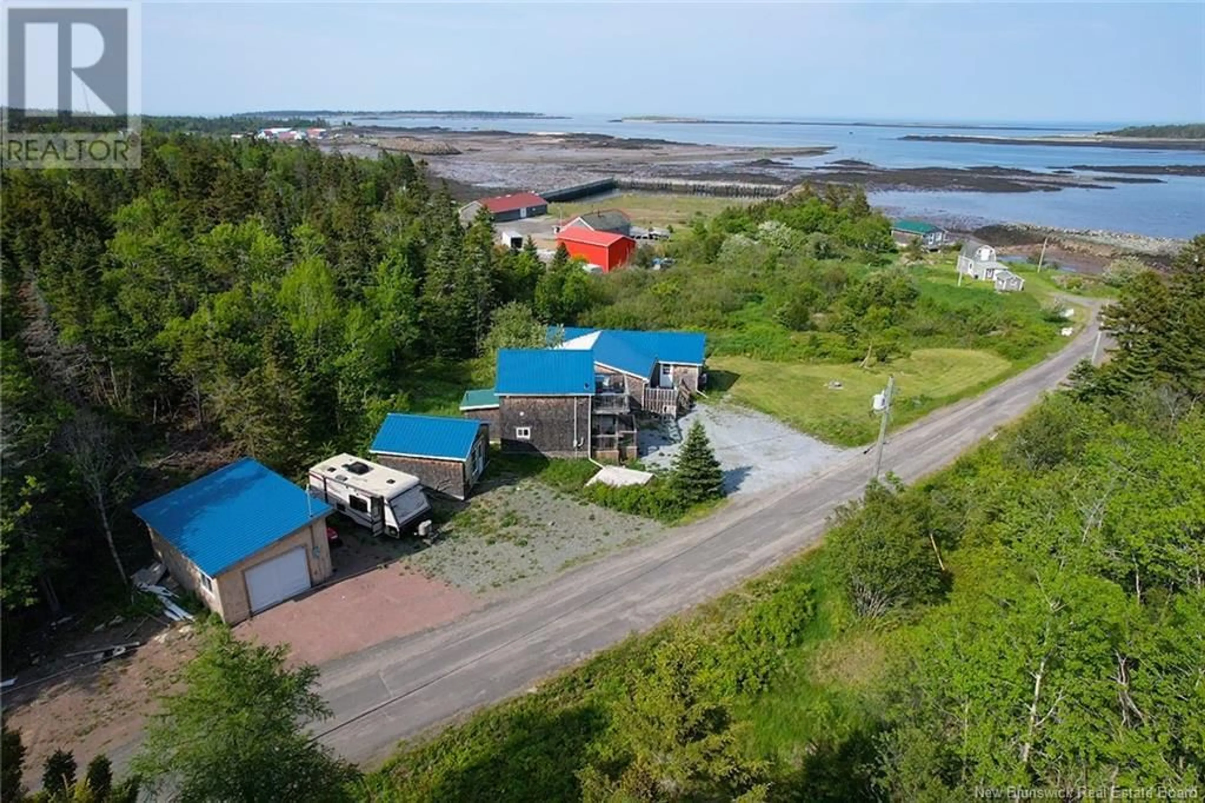A pic from outside/outdoor area/front of a property/back of a property/a pic from drone, water/lake/river/ocean view for 11 COOK ROAD, Grand Manan New Brunswick E5G4E3