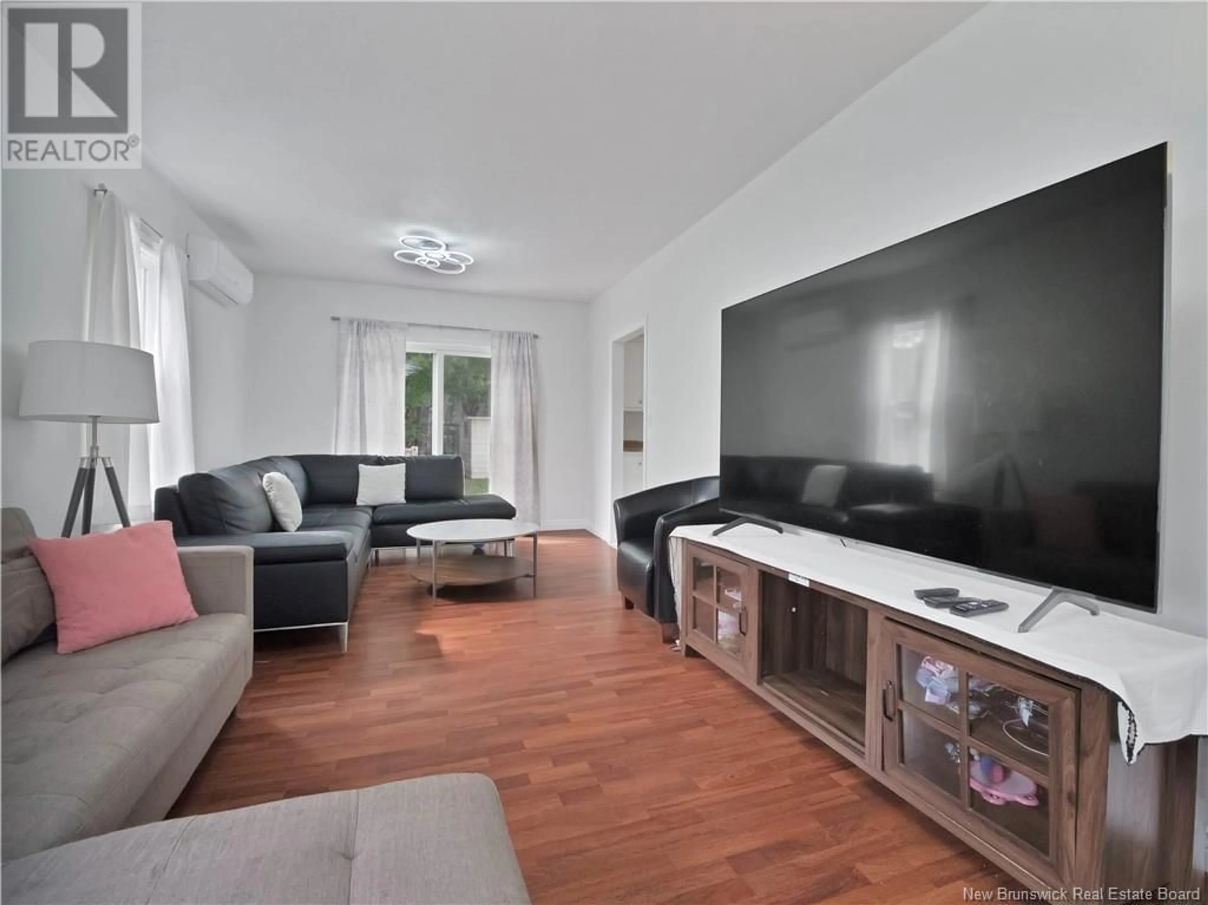 Living room with furniture, unknown for 184 GOULD STREET, Dieppe New Brunswick E1A1T9