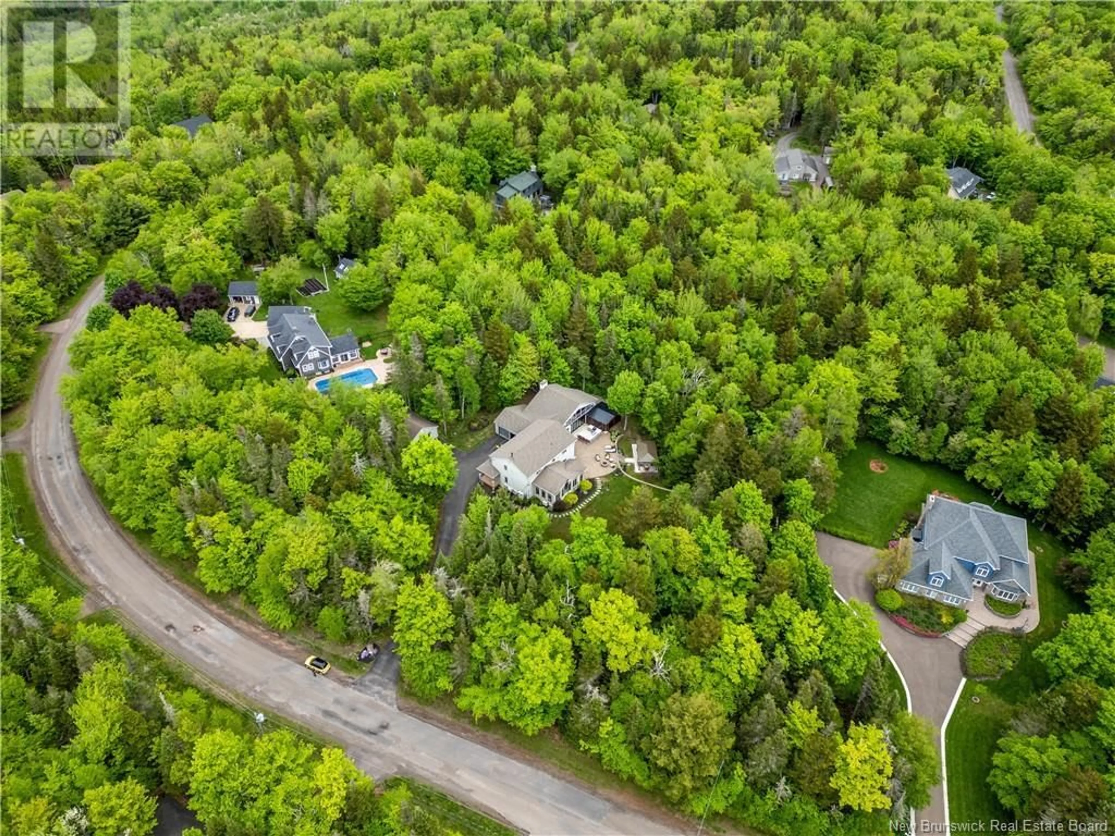 A pic from outside/outdoor area/front of a property/back of a property/a pic from drone, forest/trees view for 83 BIRCH HILL CRESCENT, Ammon New Brunswick E1G4R2