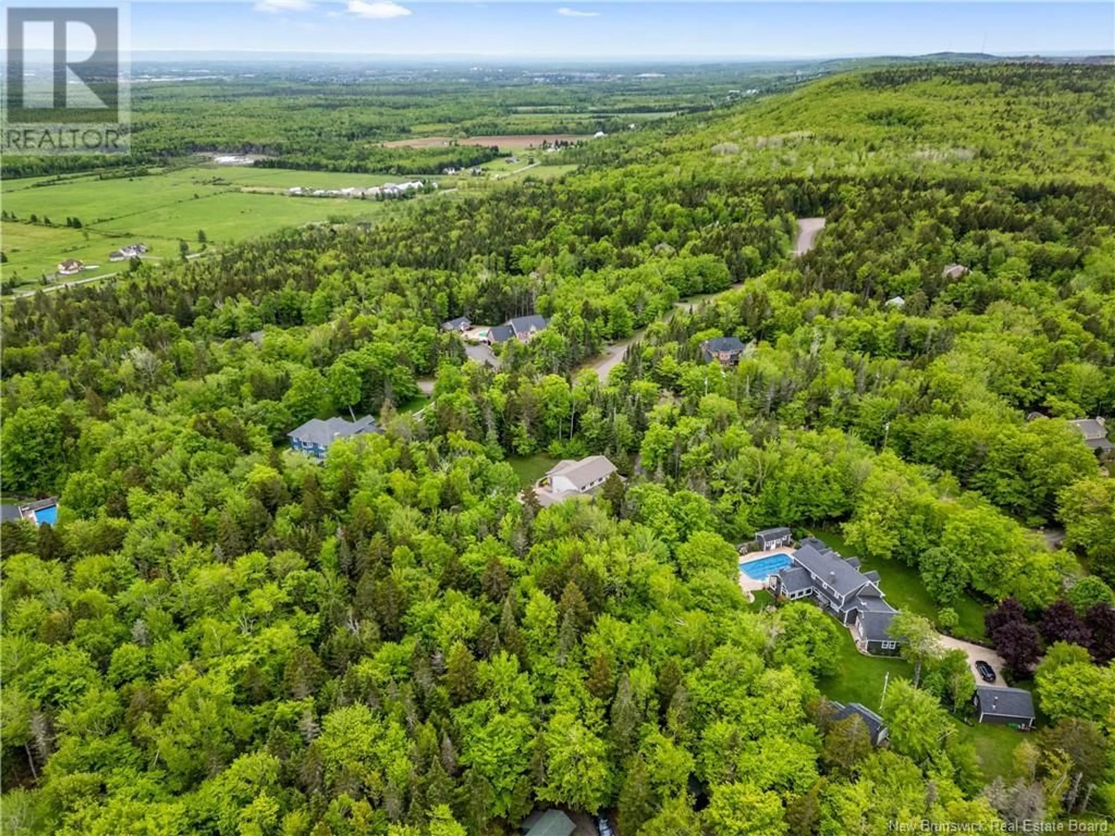A pic from outside/outdoor area/front of a property/back of a property/a pic from drone, forest/trees view for 83 BIRCH HILL CRESCENT, Ammon New Brunswick E1G4R2