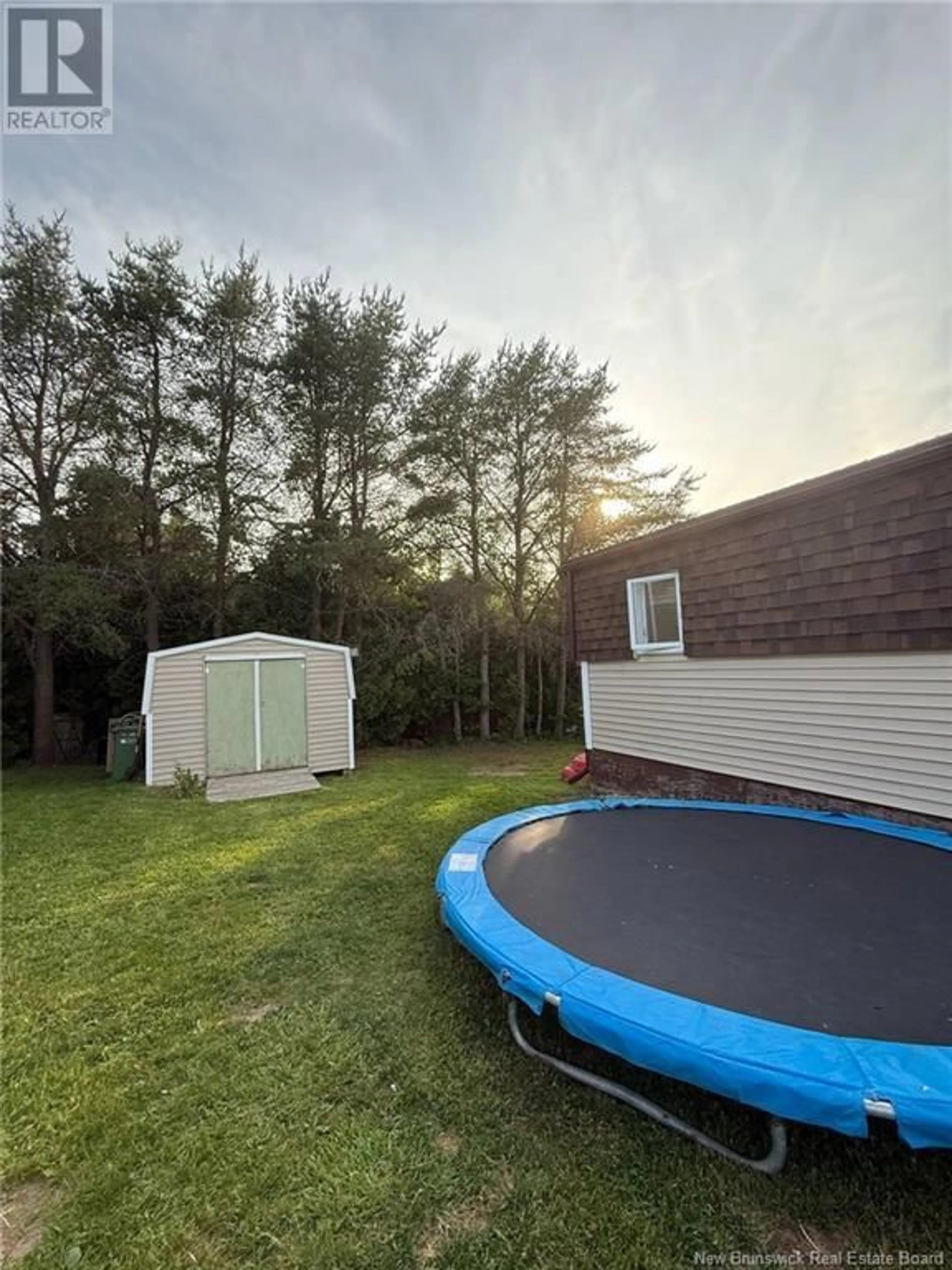 A pic from outside/outdoor area/front of a property/back of a property/a pic from drone, unknown for 18 SIXTH STREET, Quispamsis New Brunswick E2G1W3