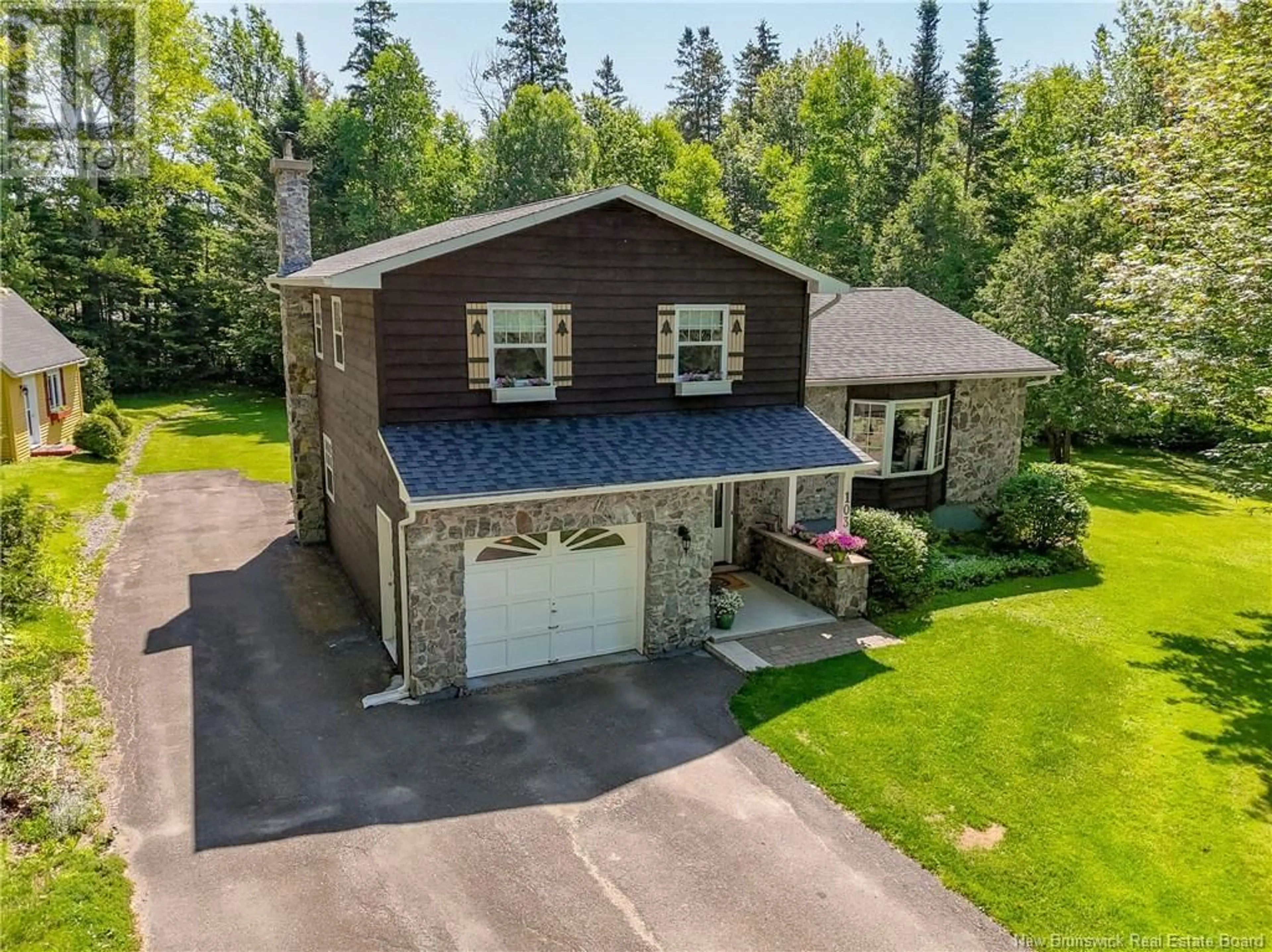 A pic from outside/outdoor area/front of a property/back of a property/a pic from drone, street for 103 OLD MILL ROAD, Island View New Brunswick E3E1A3
