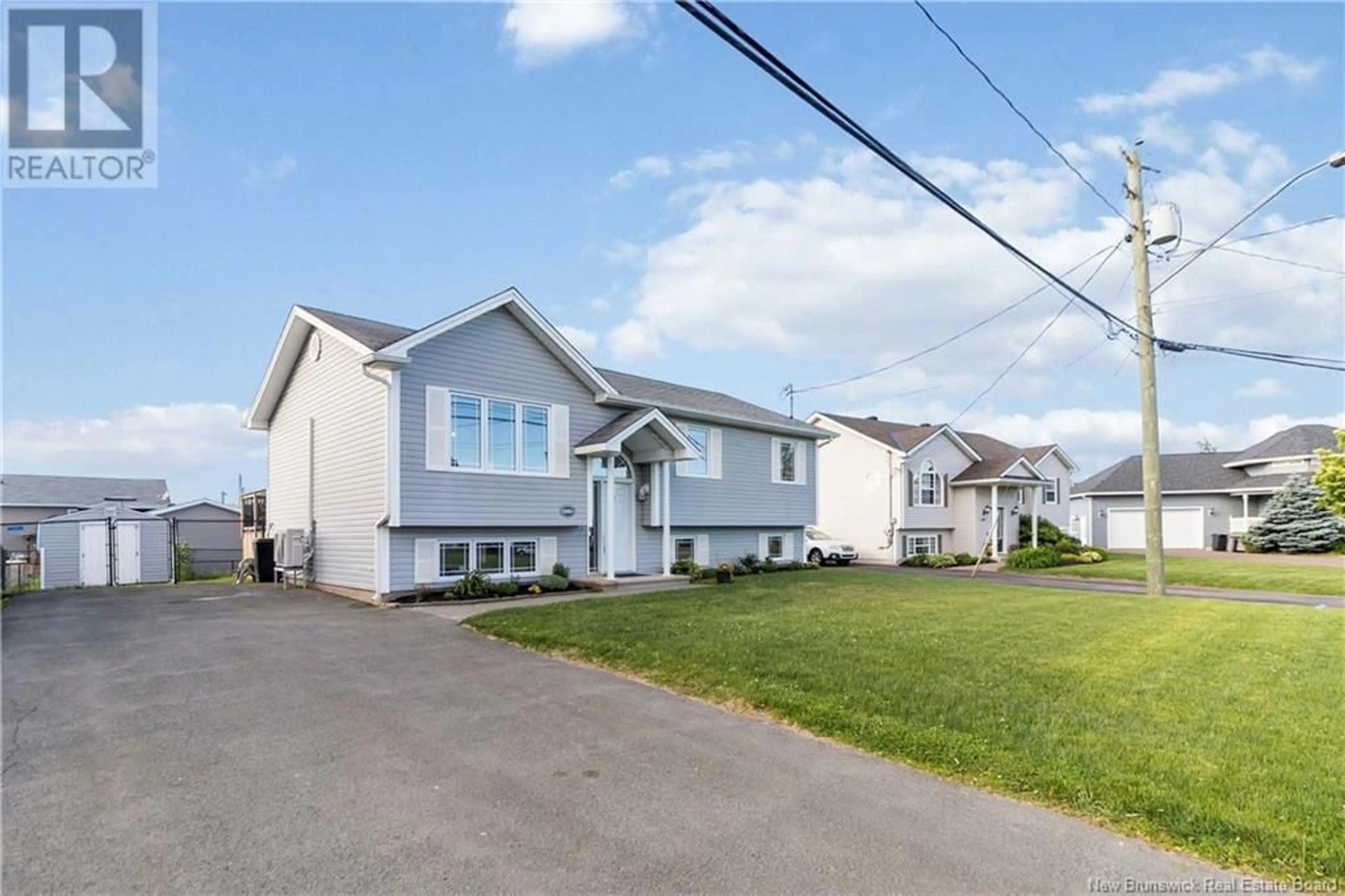 Home with vinyl exterior material, street for 265 BULMAN DRIVE, Moncton New Brunswick E1G5P5