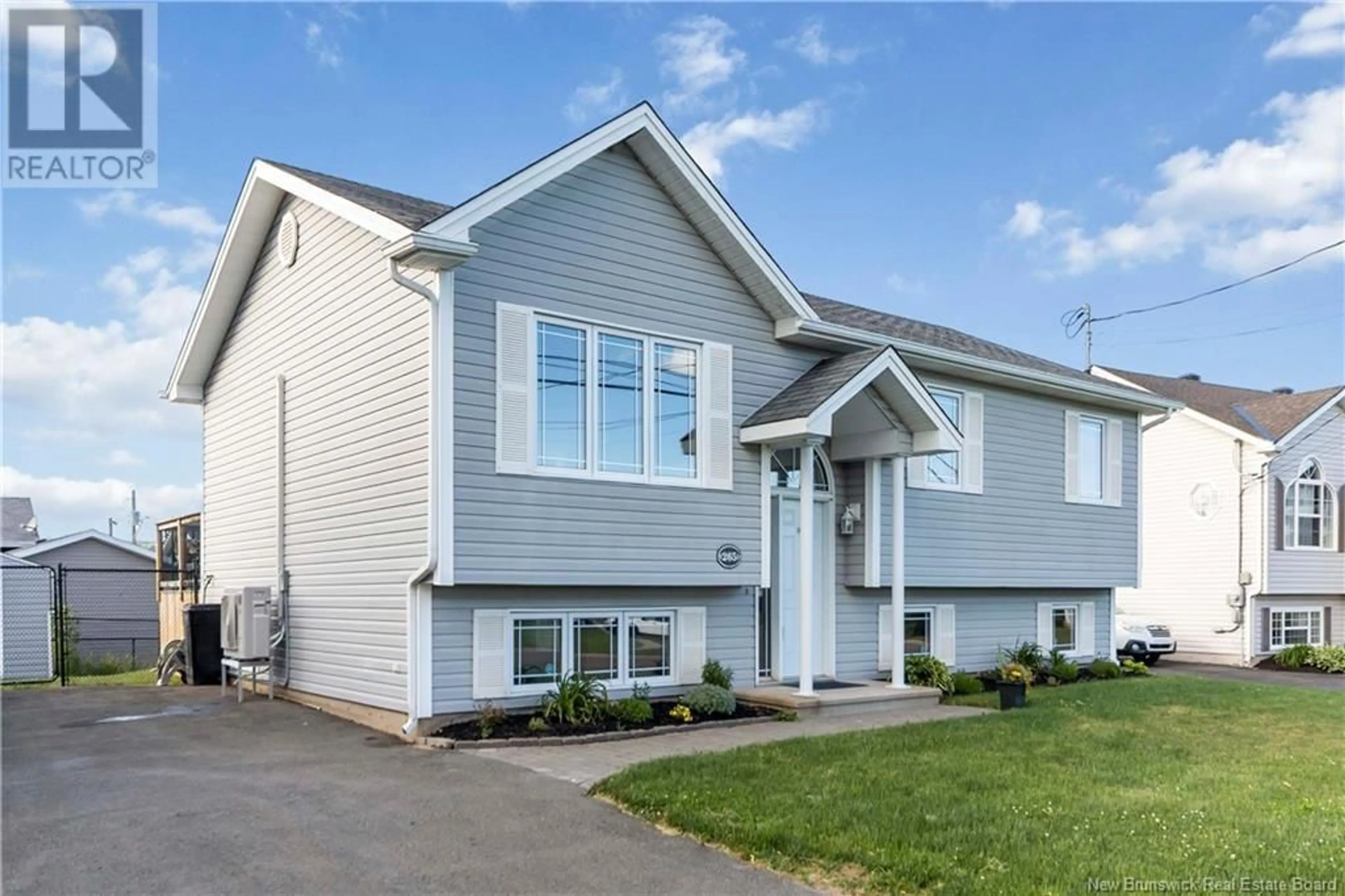 Home with vinyl exterior material, street for 265 BULMAN DRIVE, Moncton New Brunswick E1G5P5