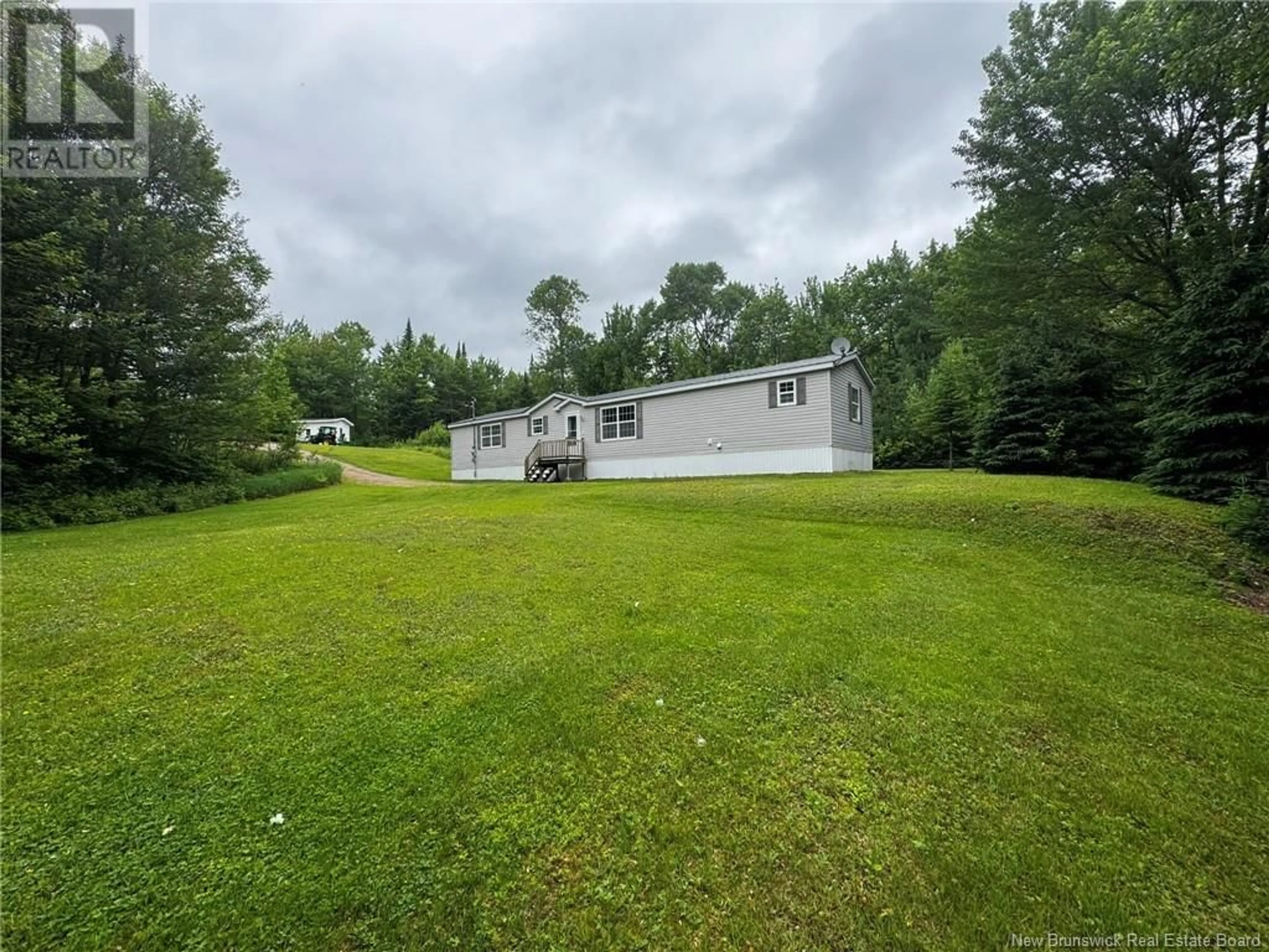 A pic from outside/outdoor area/front of a property/back of a property/a pic from drone, water/lake/river/ocean view for 47 MANDERVILLE LANE, Renous New Brunswick E9E2S2
