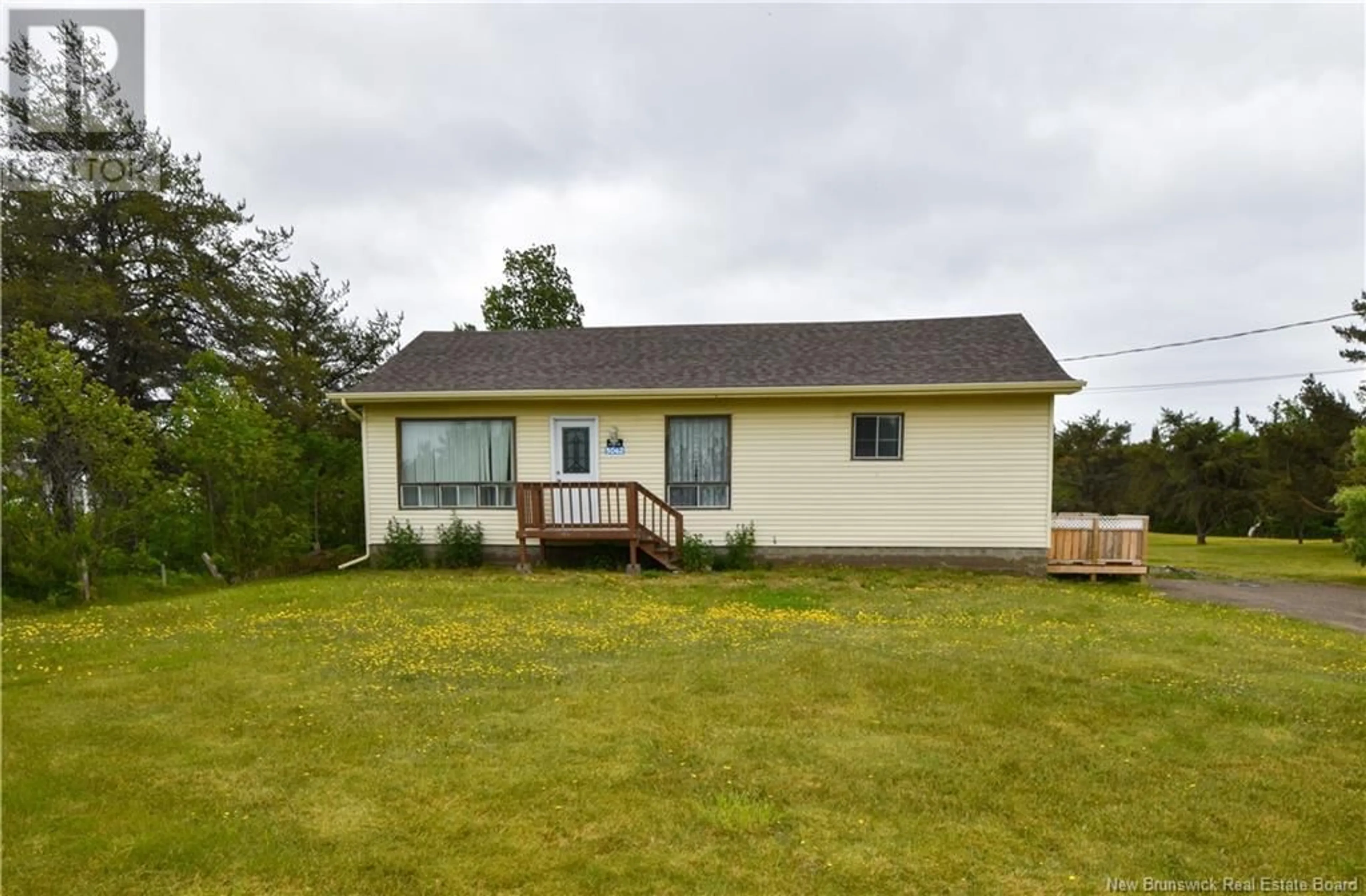 A pic from outside/outdoor area/front of a property/back of a property/a pic from drone, unknown for 5062 ROUTE 11, Brantville New Brunswick E9H1N1