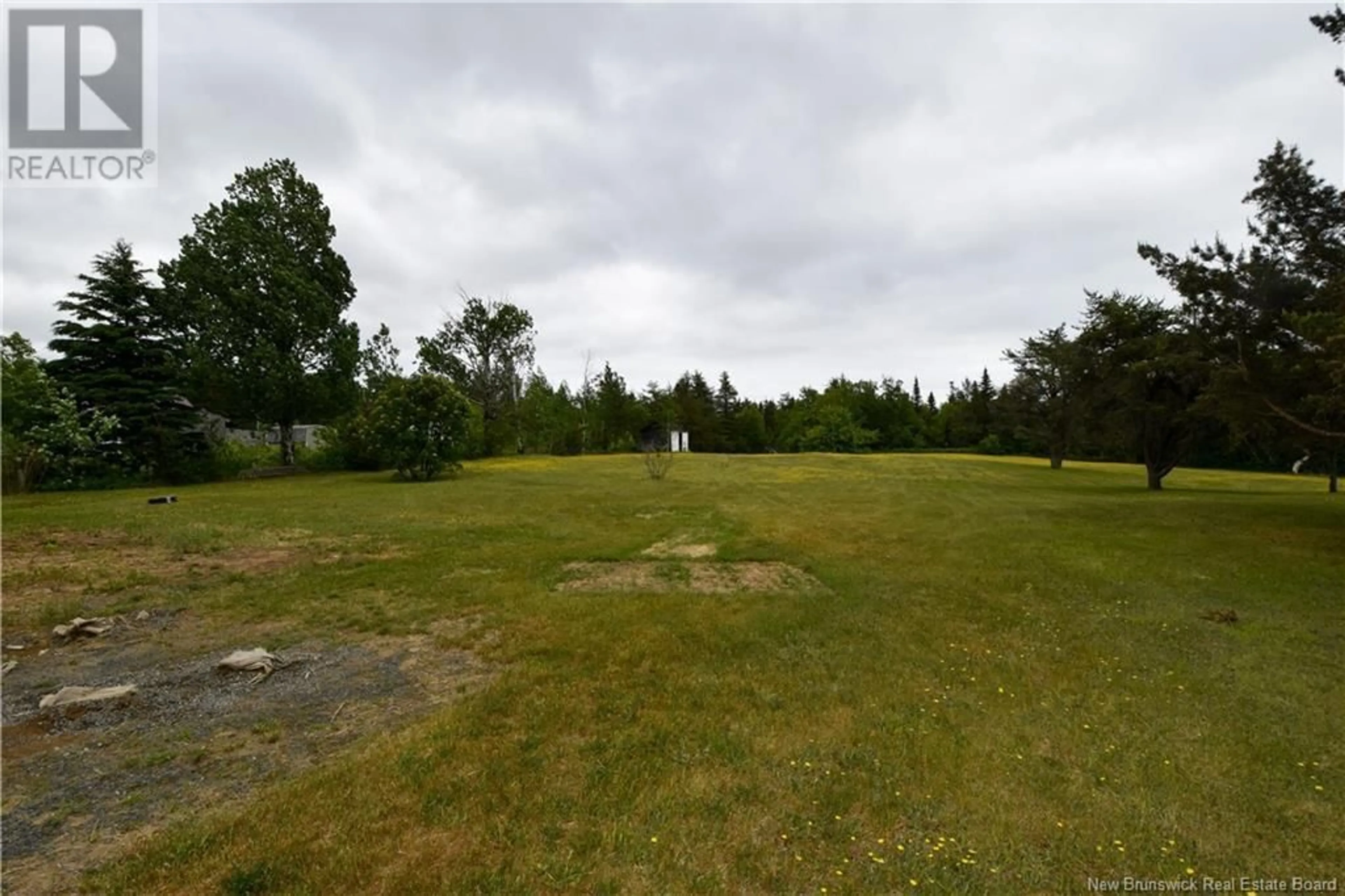 A pic from outside/outdoor area/front of a property/back of a property/a pic from drone, unknown for 5062 ROUTE 11, Brantville New Brunswick E9H1N1