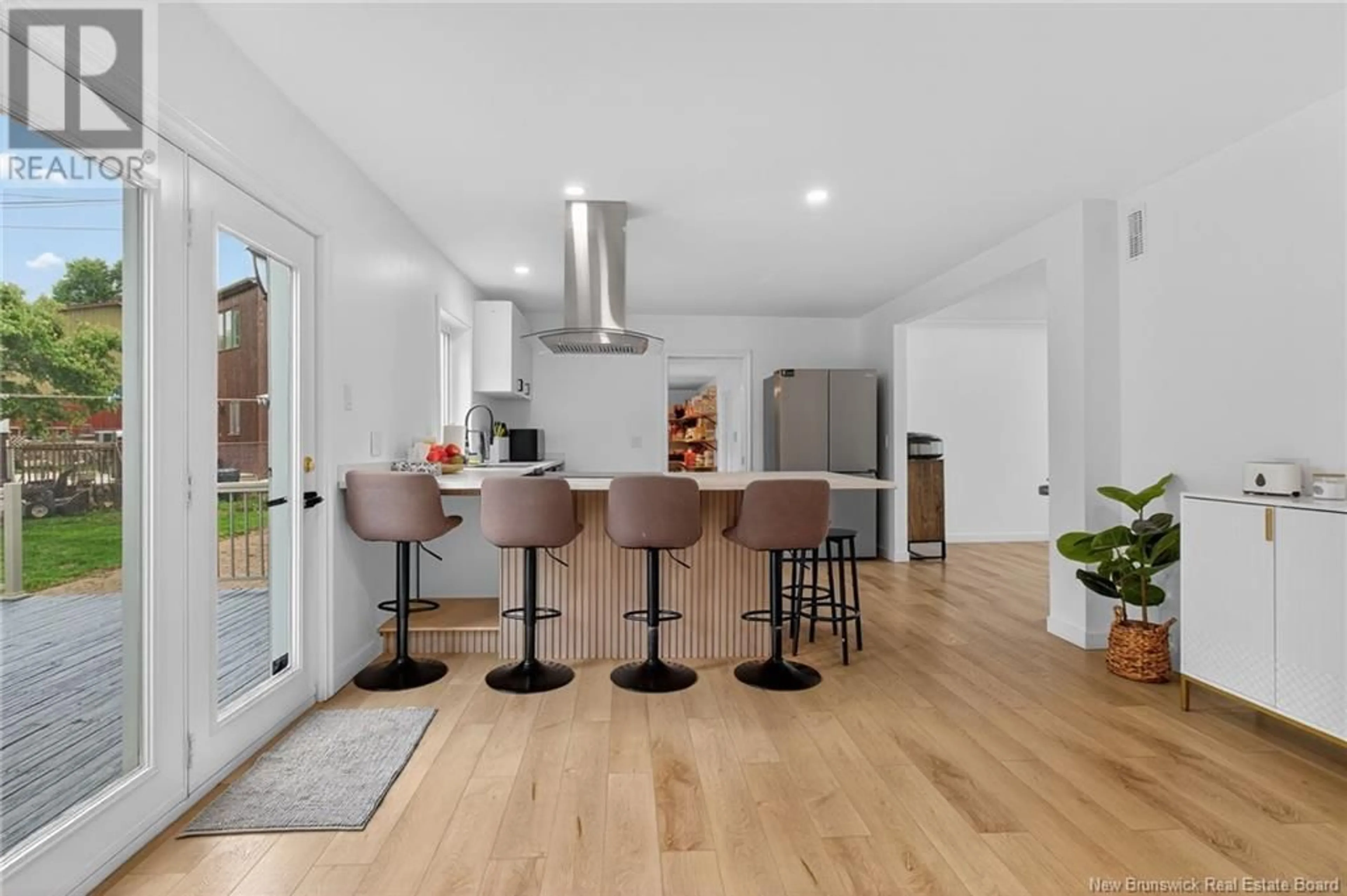 Open concept kitchen, wood/laminate floor for 78 TEAKWOOD WAY, Moncton New Brunswick E1G1V3