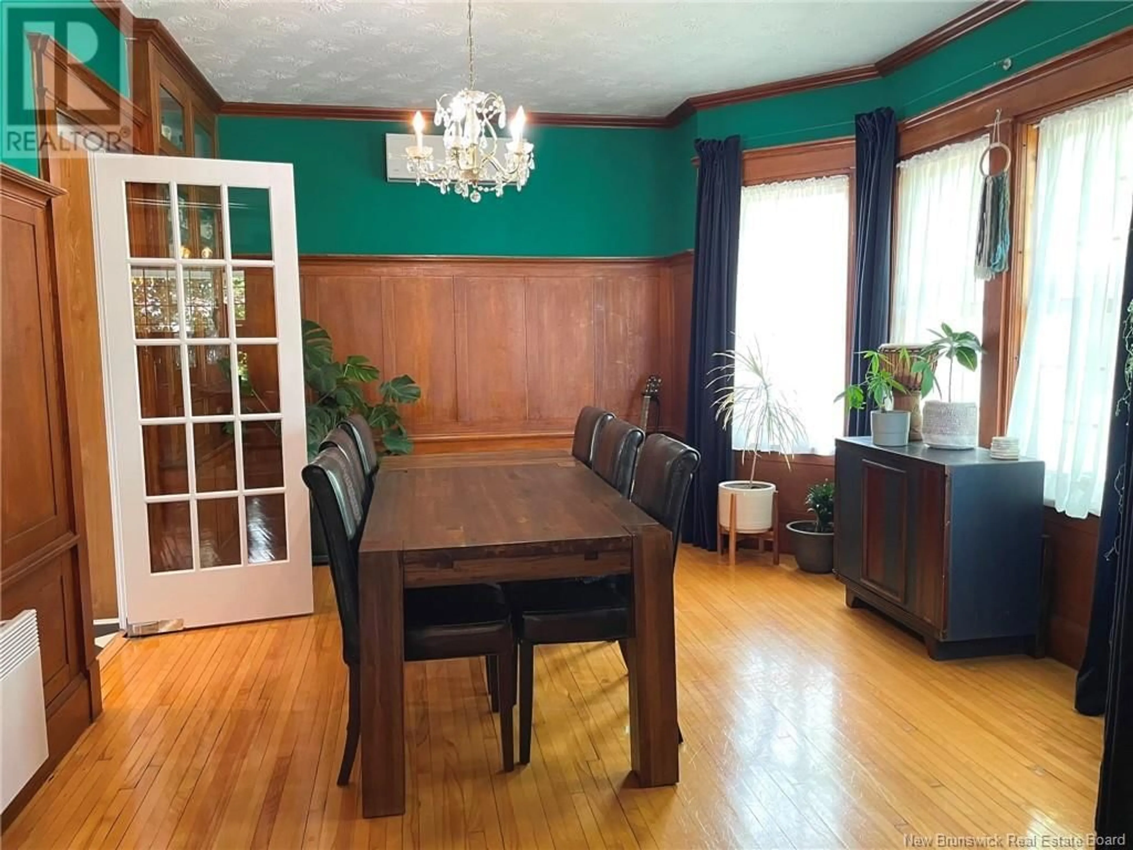 Dining room, wood/laminate floor for 32-34 BERNIER, Edmundston New Brunswick E3V1Y5