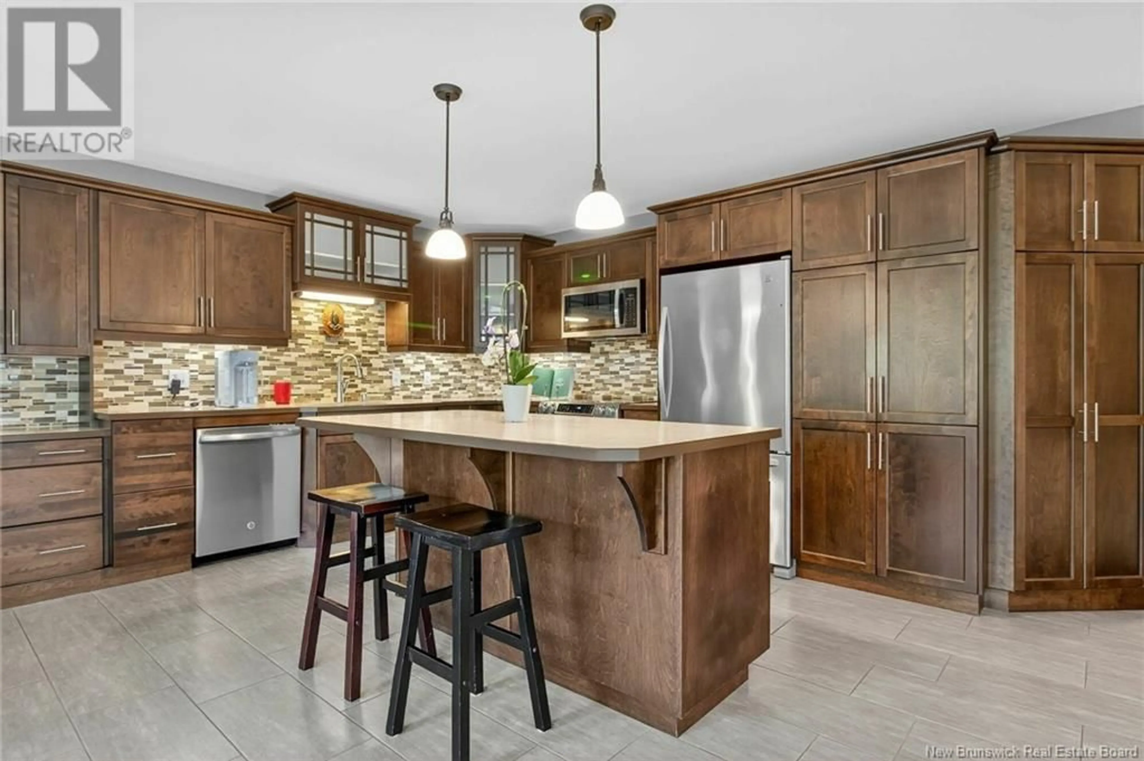Open concept kitchen, ceramic/tile floor for 343 RUE DOLBEAU STREET, Dieppe New Brunswick E1A9P9