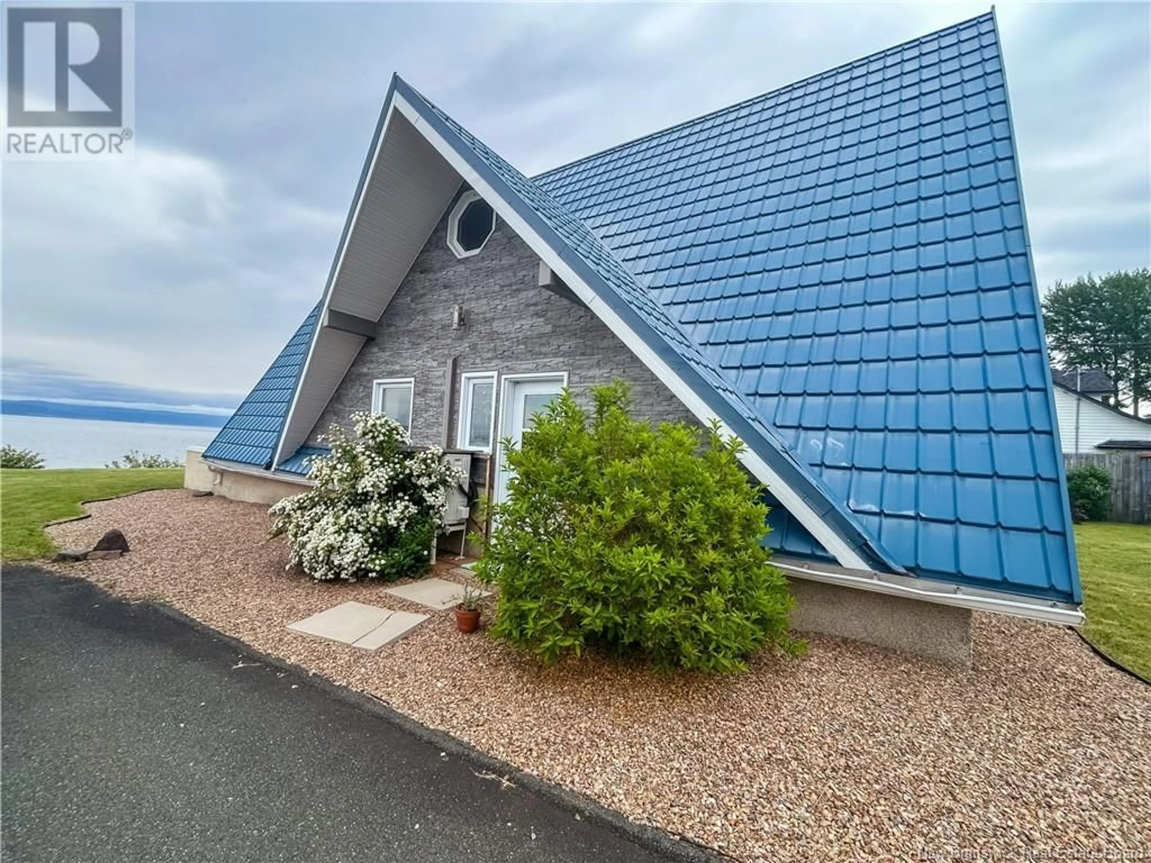 Home with vinyl exterior material, water/lake/river/ocean view for 11 21 LANE, Charlo New Brunswick E8E2V3