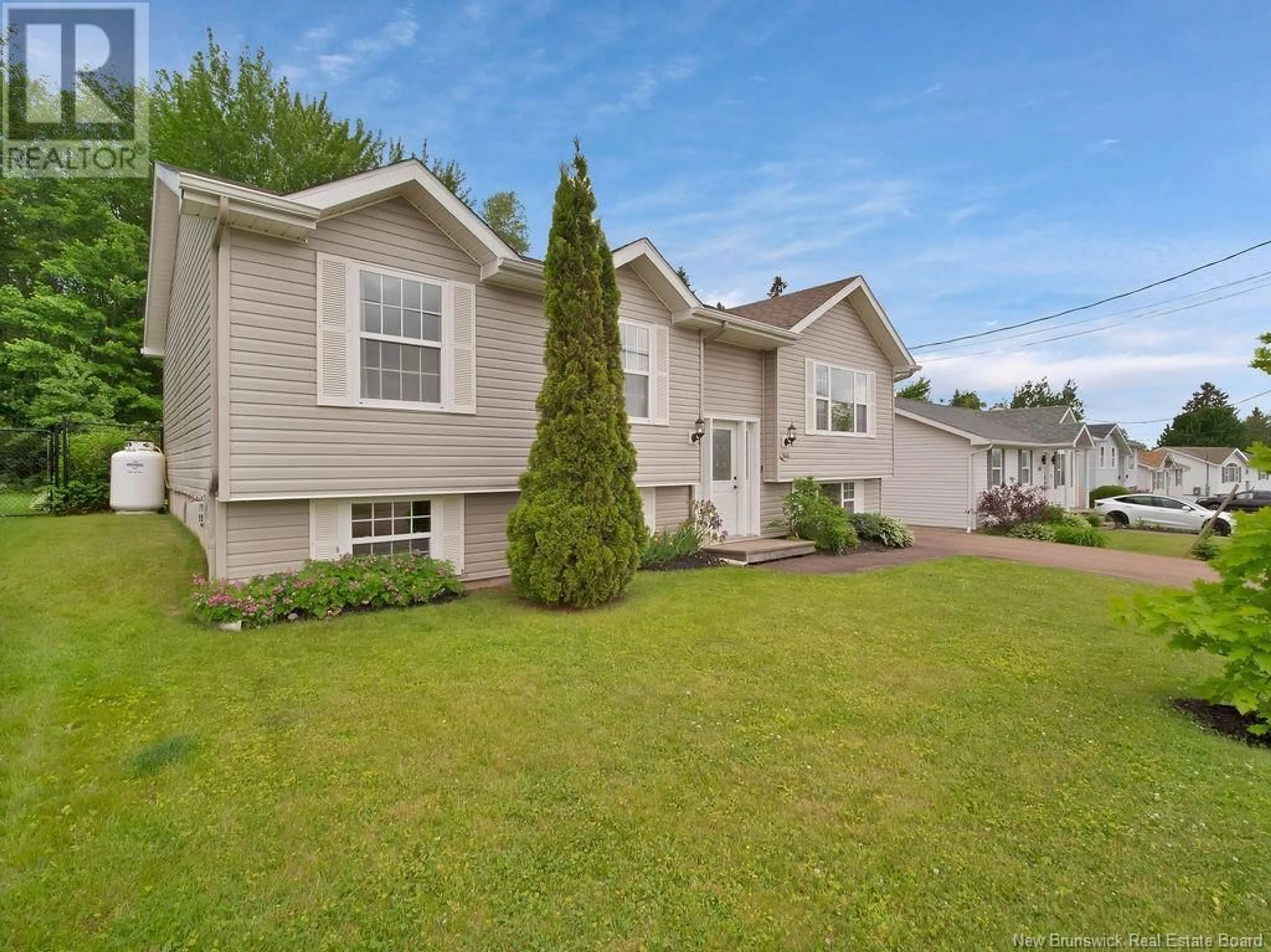 Home with vinyl exterior material, street for 544 PIERRE STREET, Dieppe New Brunswick E1A7H6