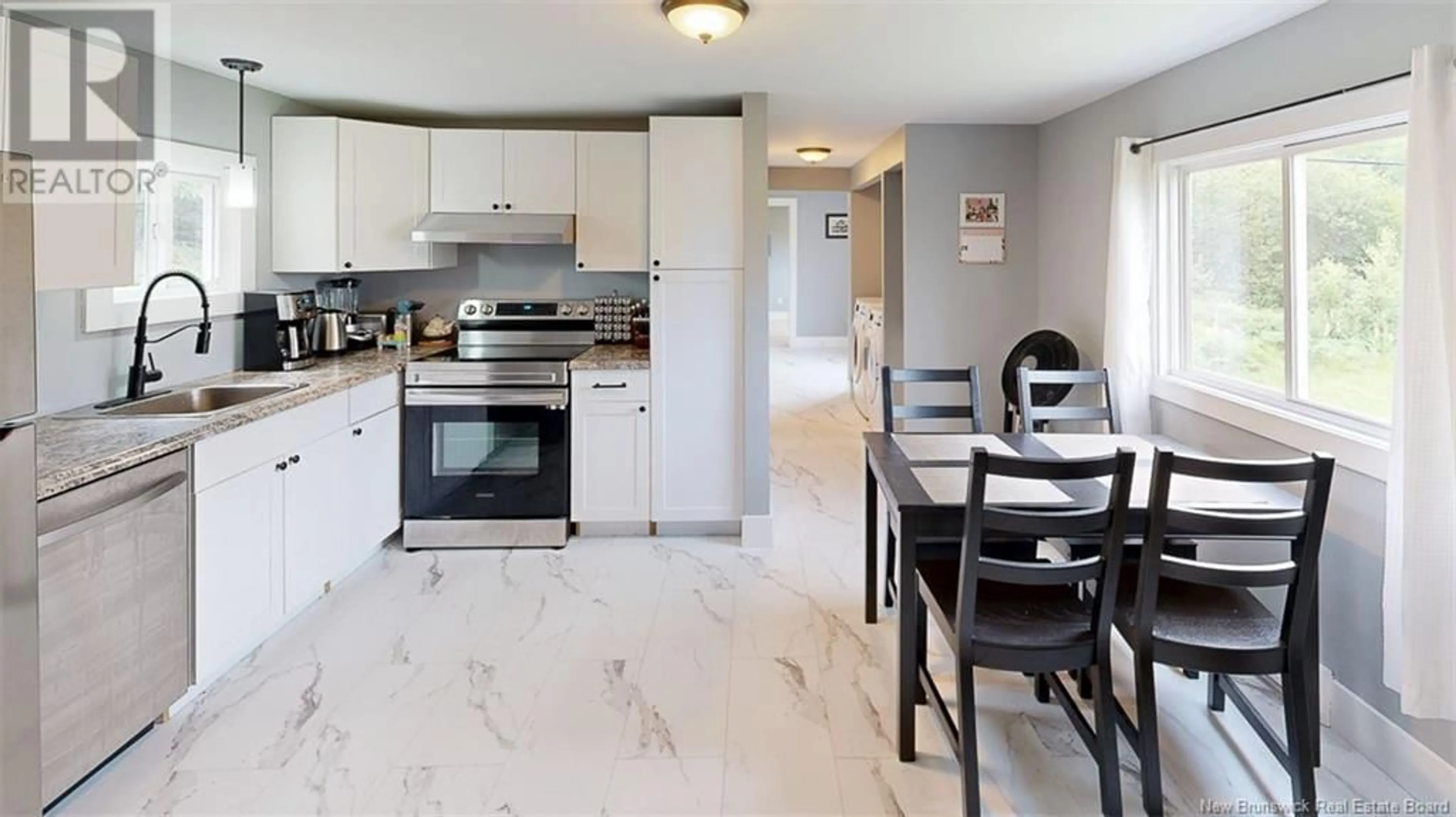Open concept kitchen, ceramic/tile floor for 14 TAMARACK DRIVE, Lincoln New Brunswick E3B6T1