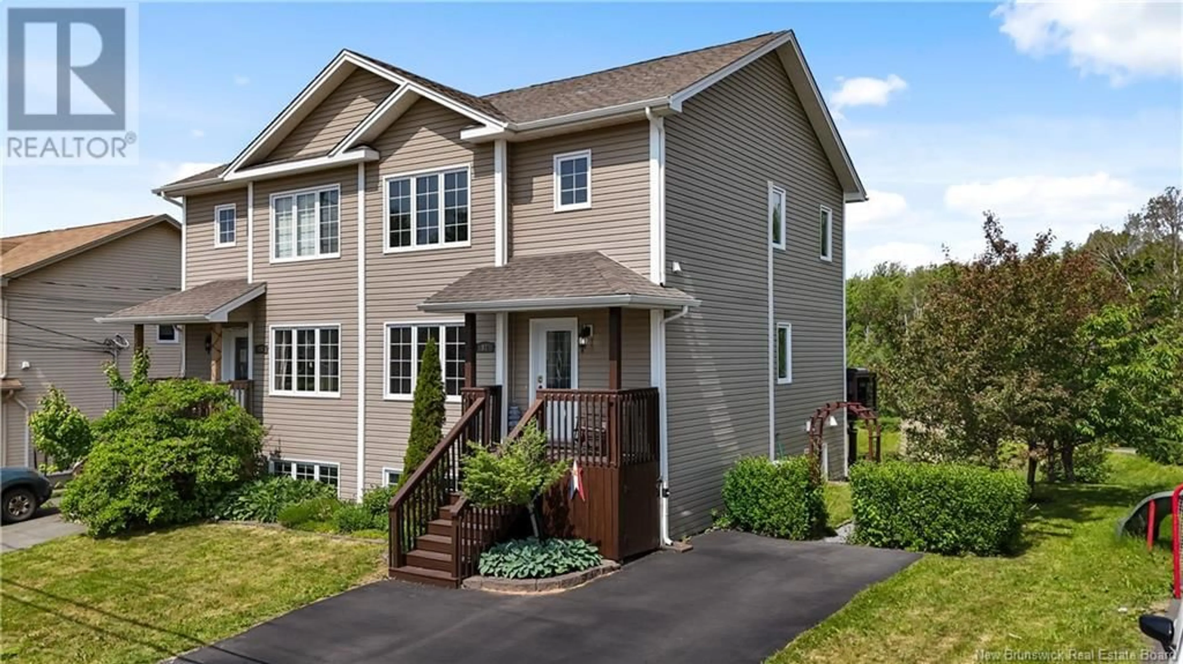 Home with vinyl exterior material, street for 92 BELLE-FORET STREET, Dieppe New Brunswick E1A8X9