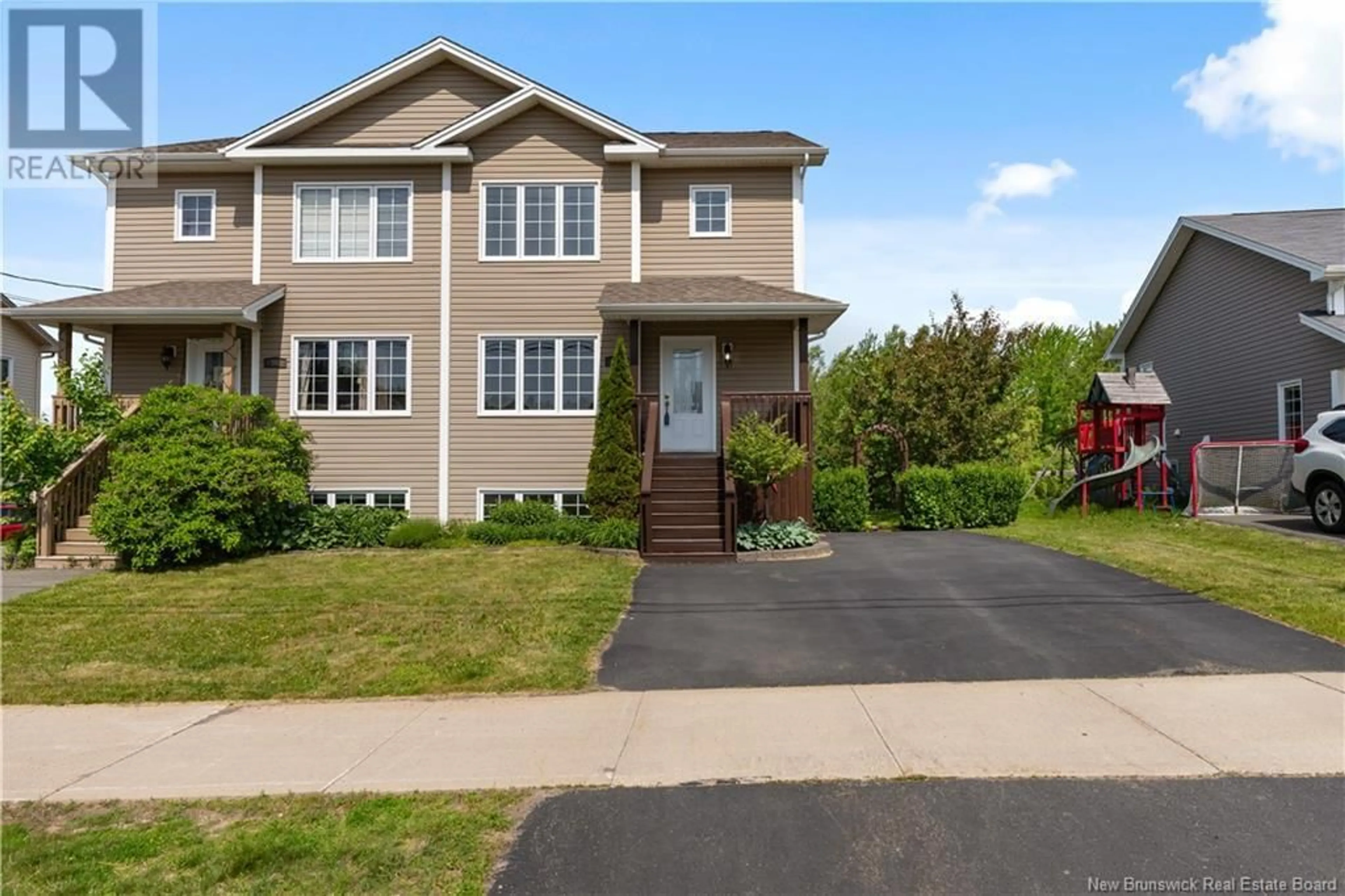 Home with vinyl exterior material, street for 92 BELLE-FORET STREET, Dieppe New Brunswick E1A8X9