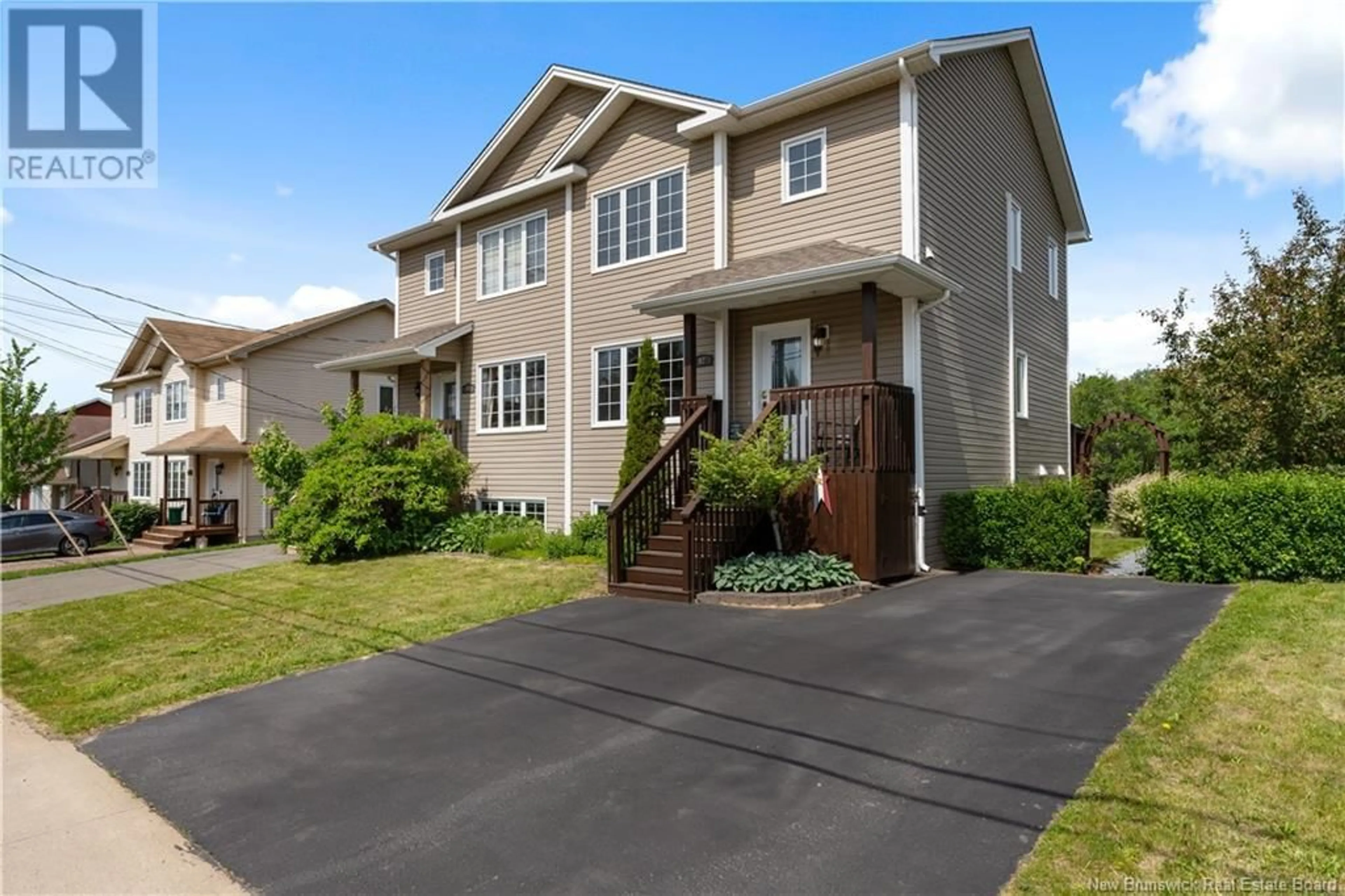 Home with vinyl exterior material, street for 92 BELLE-FORET STREET, Dieppe New Brunswick E1A8X9