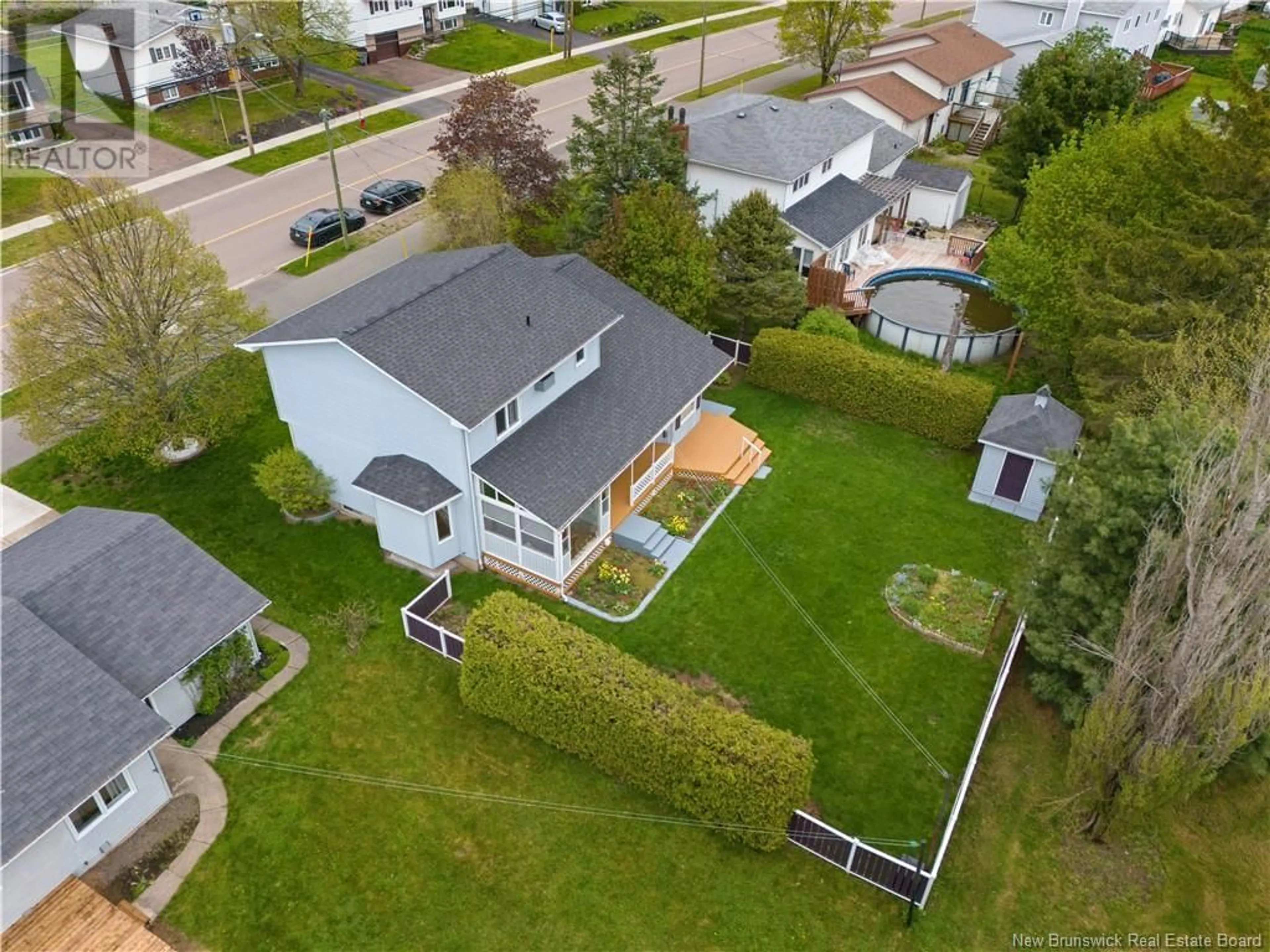 A pic from outside/outdoor area/front of a property/back of a property/a pic from drone, street for 294 HENNESSEY, Moncton New Brunswick E1A6E5