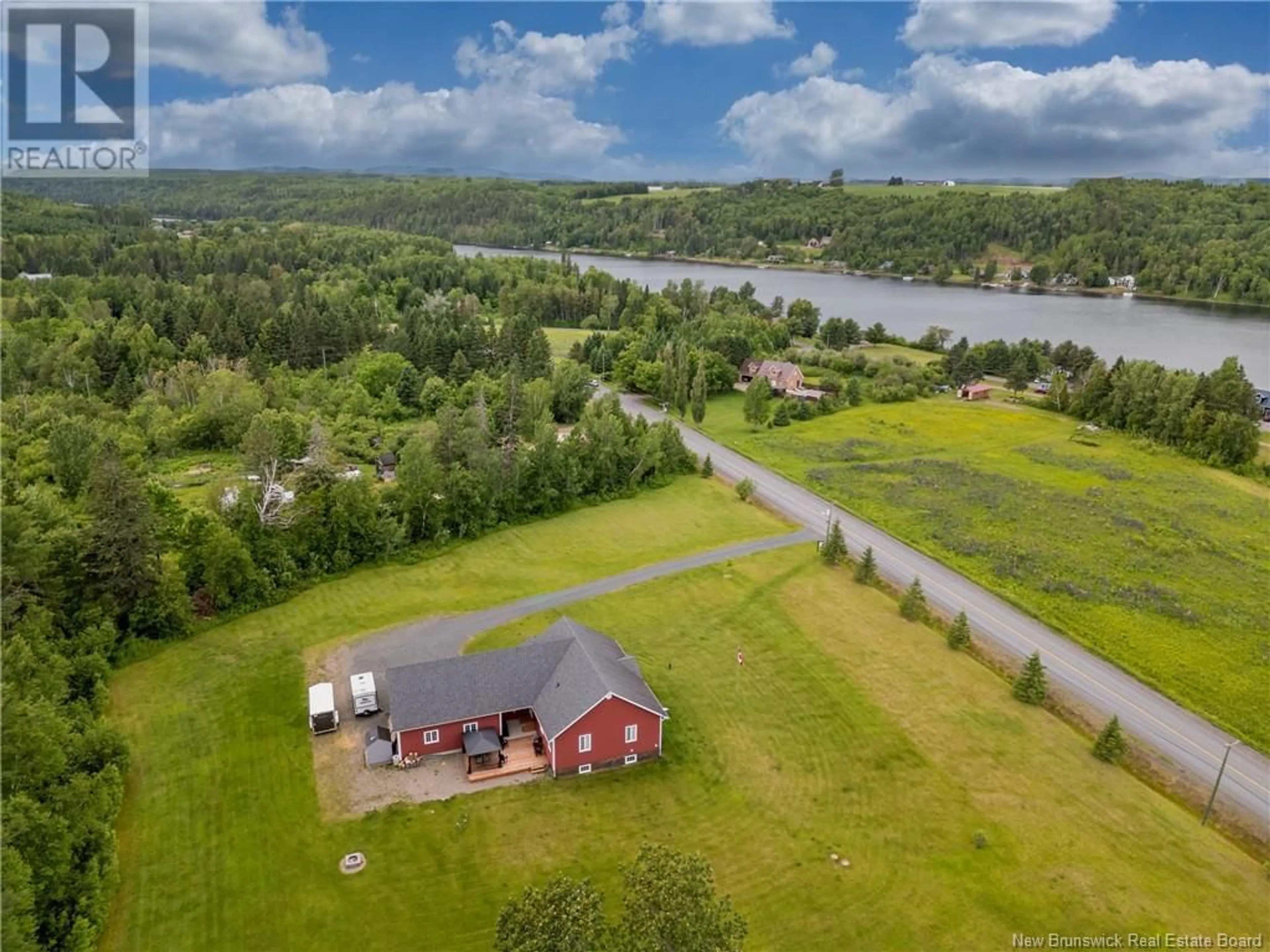 A pic from outside/outdoor area/front of a property/back of a property/a pic from drone, water/lake/river/ocean view for 1190 ROUTE 109, Red Rapids New Brunswick E7H4H3