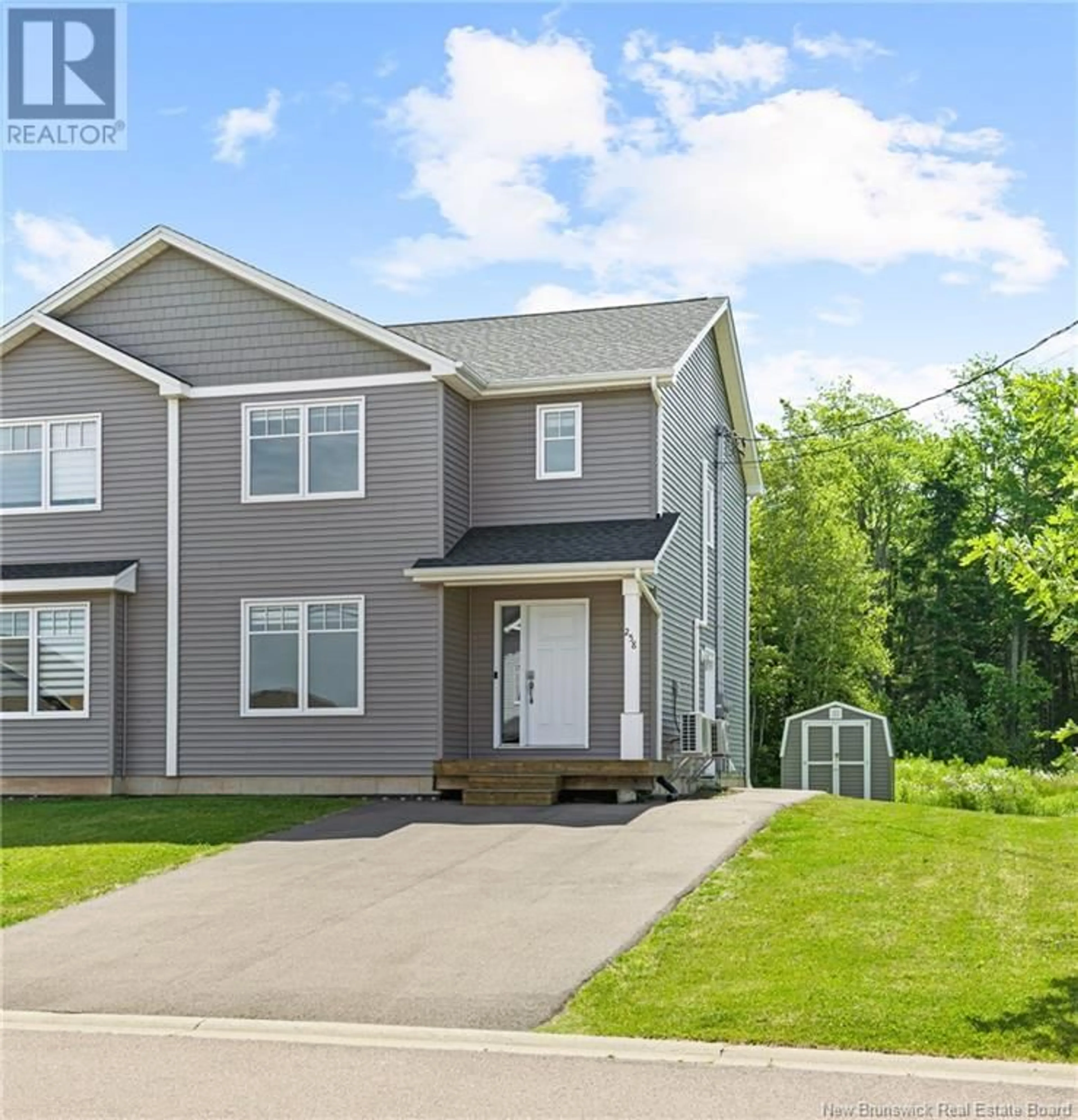 Home with vinyl exterior material, street for 258 O'NEILL STREET, Moncton New Brunswick E1A0T9