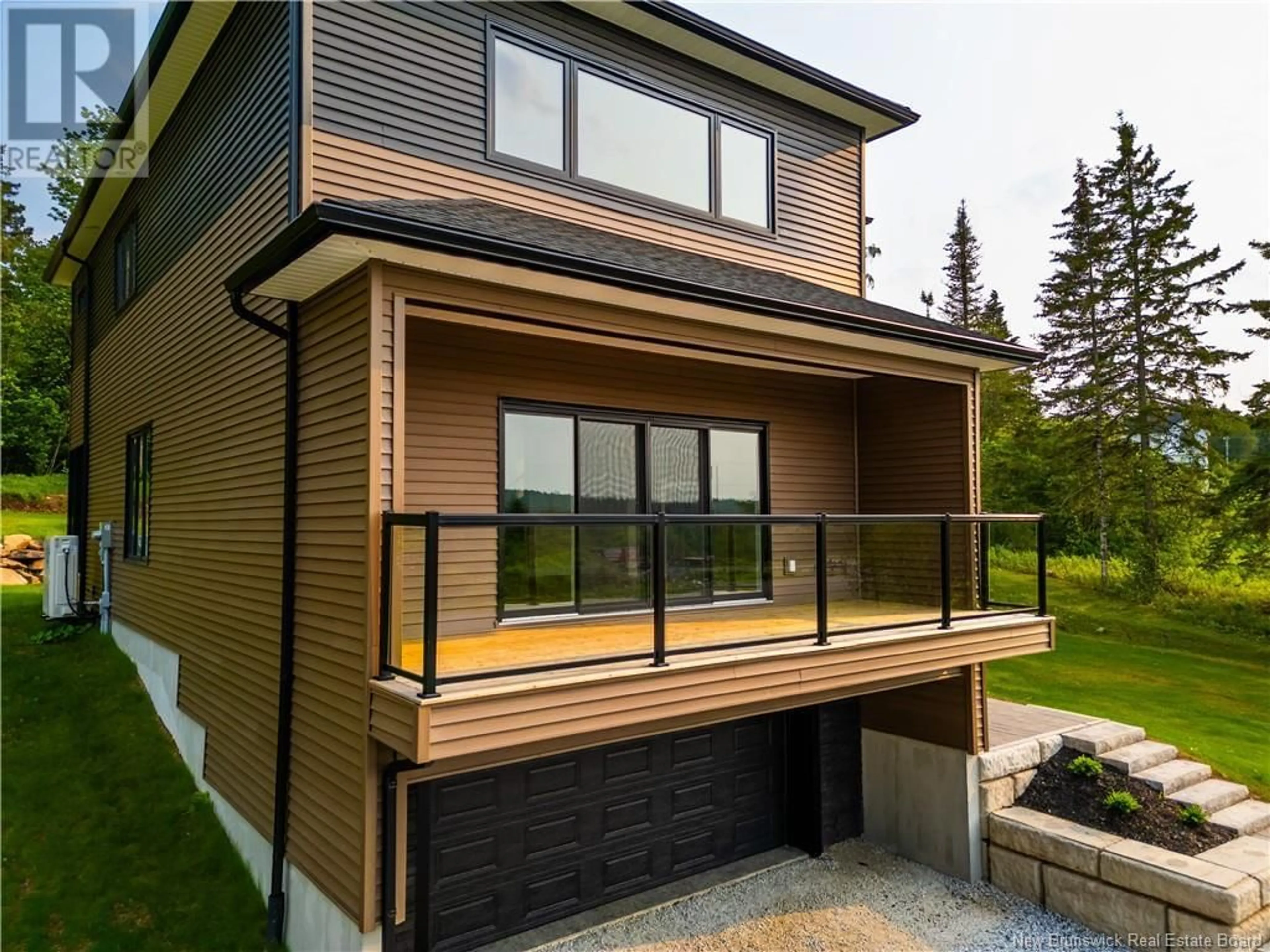 Home with vinyl exterior material, street for 10 MOTIVATION AVENUE, Quispamsis New Brunswick E2G0C8
