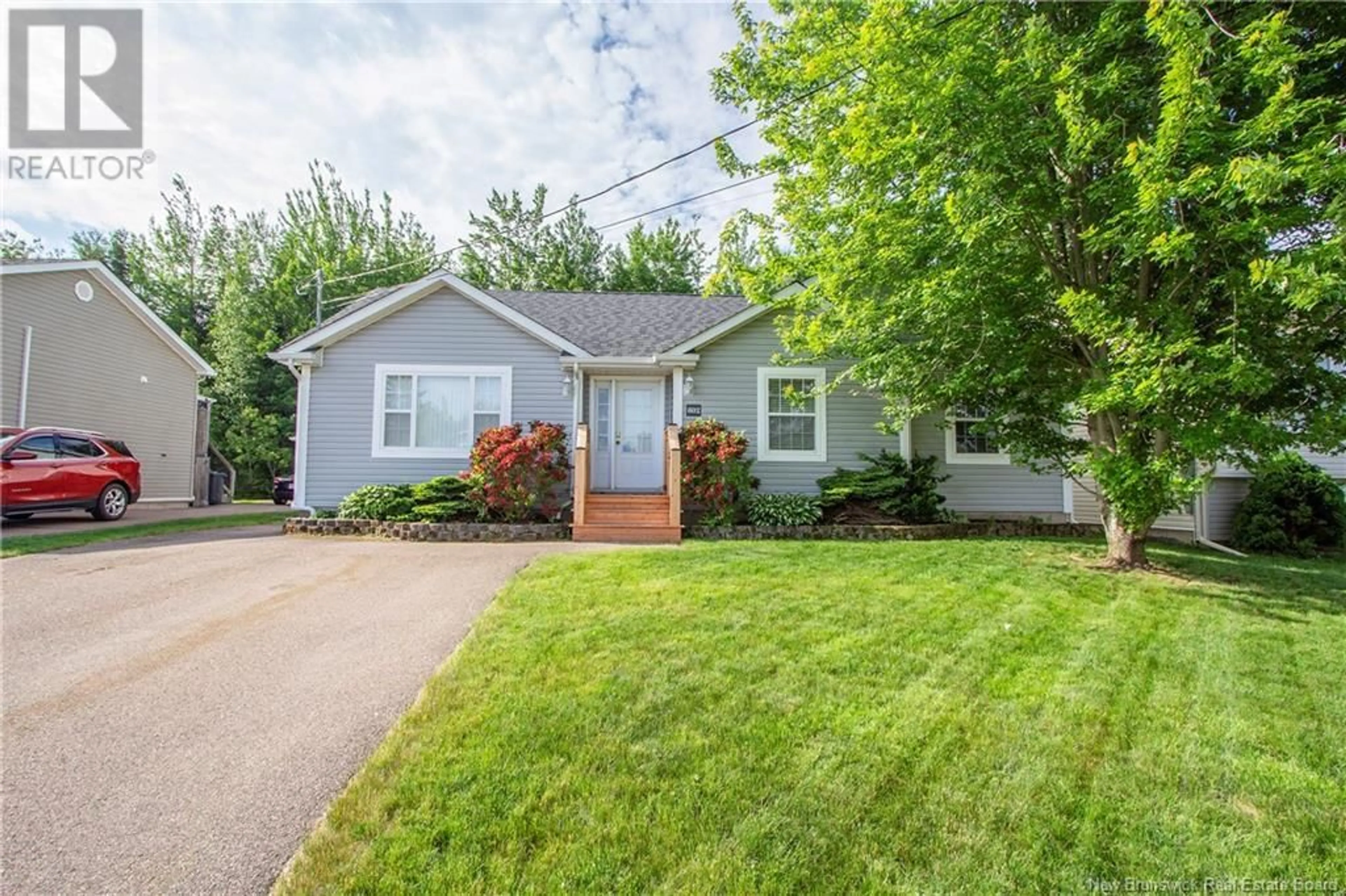 Home with vinyl exterior material, street for 602 PIERRE STREET, Dieppe New Brunswick E1A7H6
