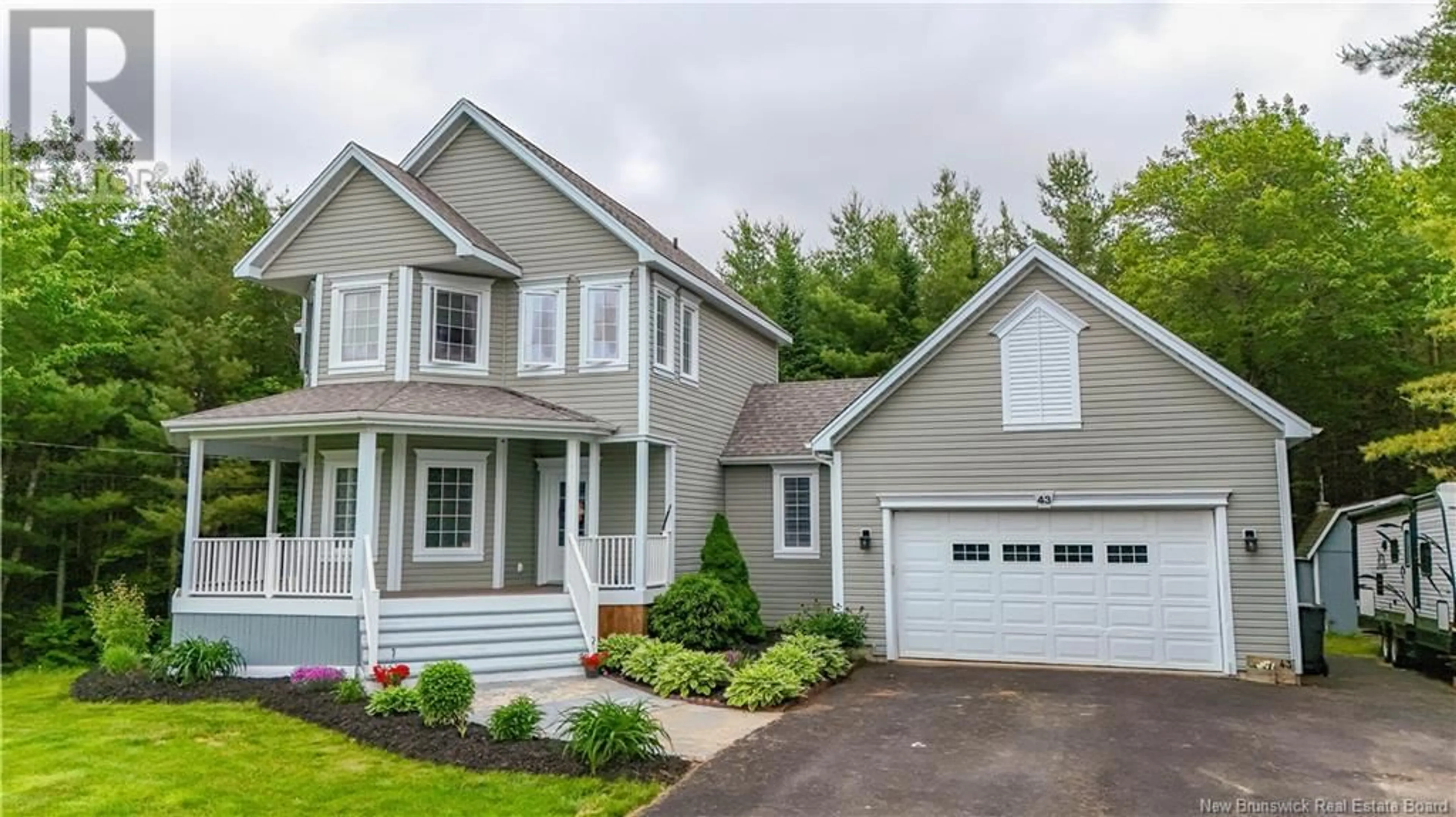 Home with vinyl exterior material, street for 43 SANDSTONE DRIVE, Hanwell New Brunswick E3E2R2