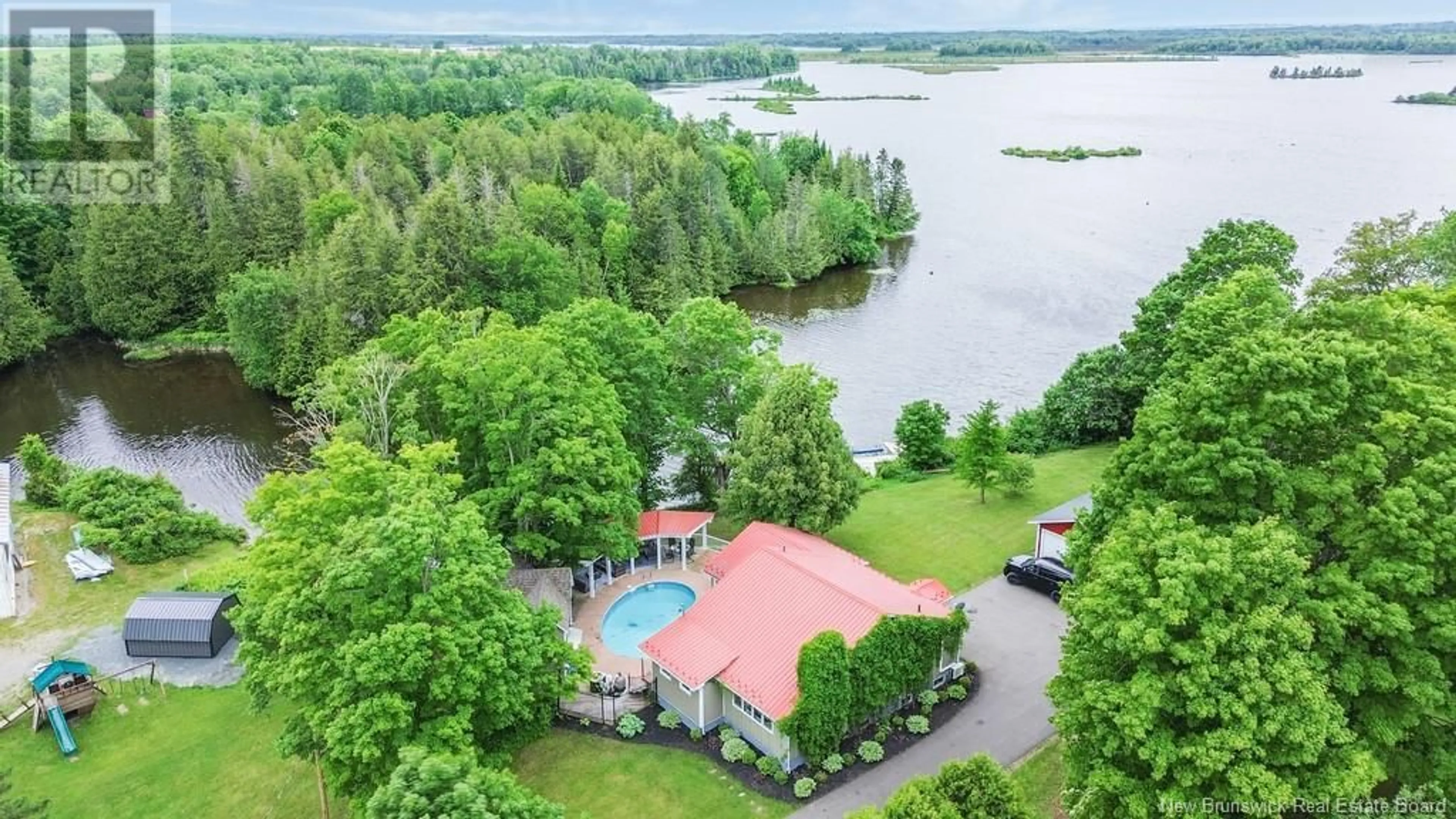 A pic from outside/outdoor area/front of a property/back of a property/a pic from drone, water/lake/river/ocean view for 2145 560 ROUTE, Lakeville New Brunswick E7K1T7