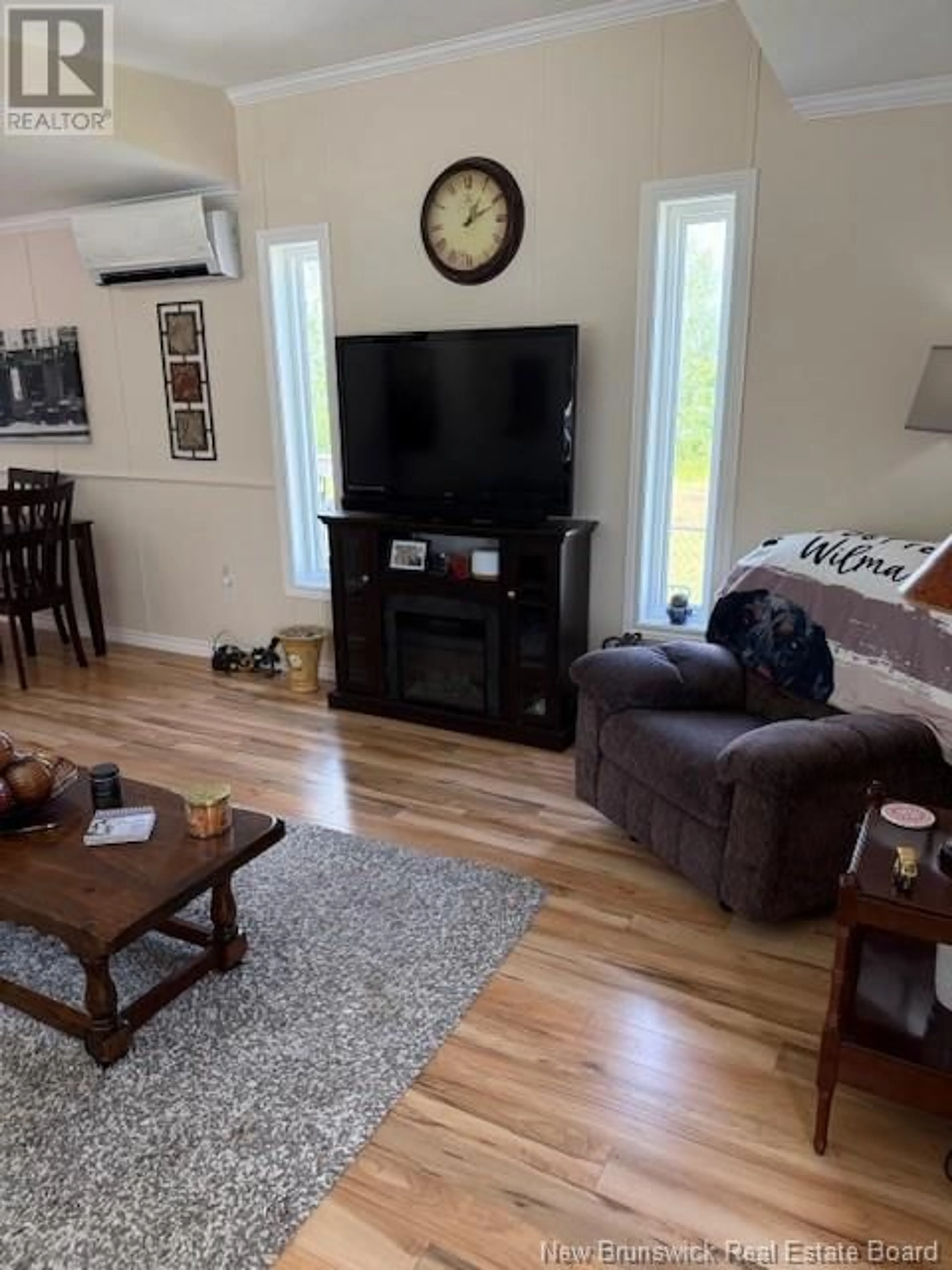 Living room with furniture, wood/laminate floor for 91 HAYWARD LANE, Riverview New Brunswick E1B0G3