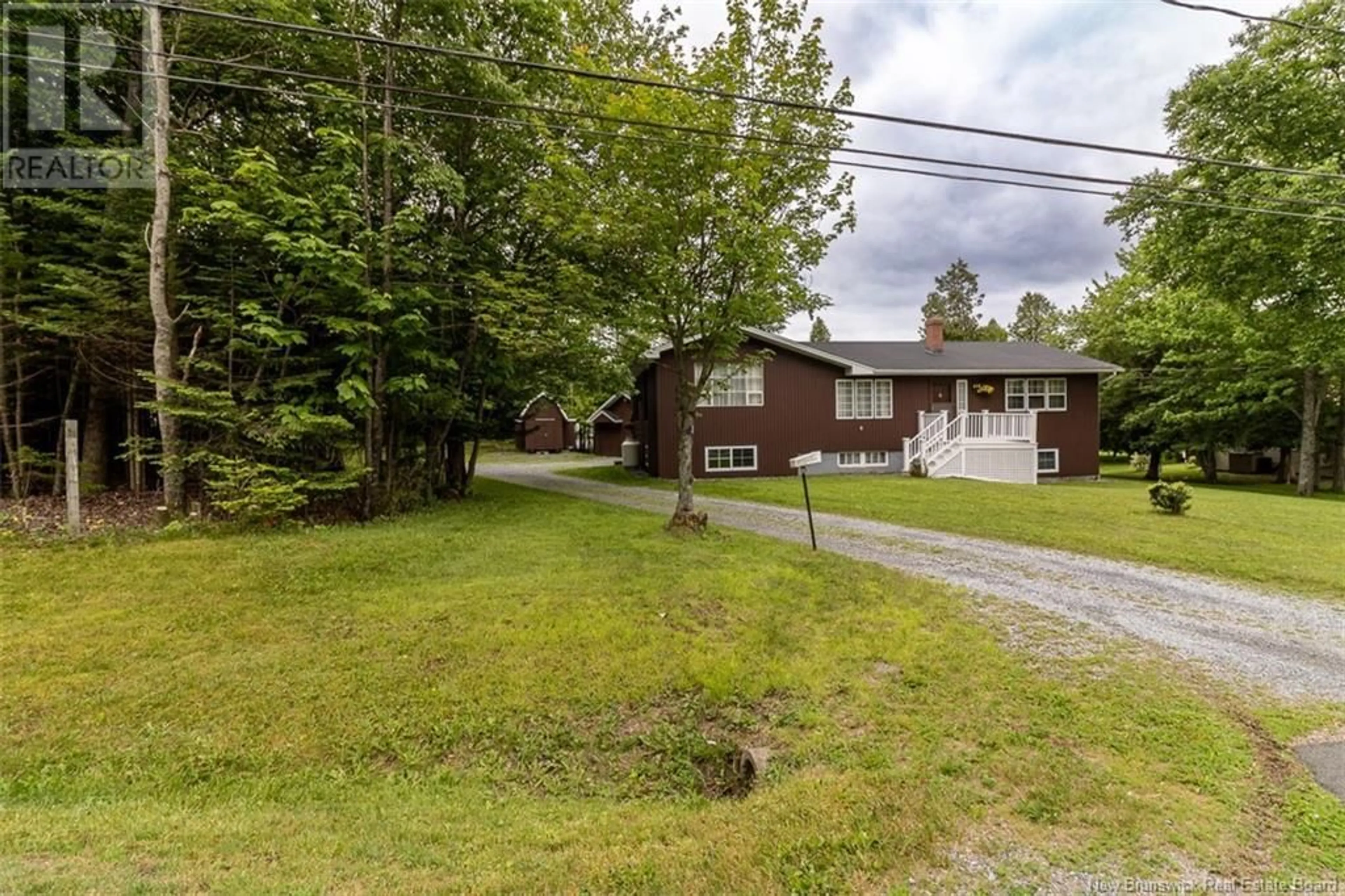 A pic from outside/outdoor area/front of a property/back of a property/a pic from drone, street for 10 WOODLAND AVENUE, Rothesay New Brunswick E2E2K5